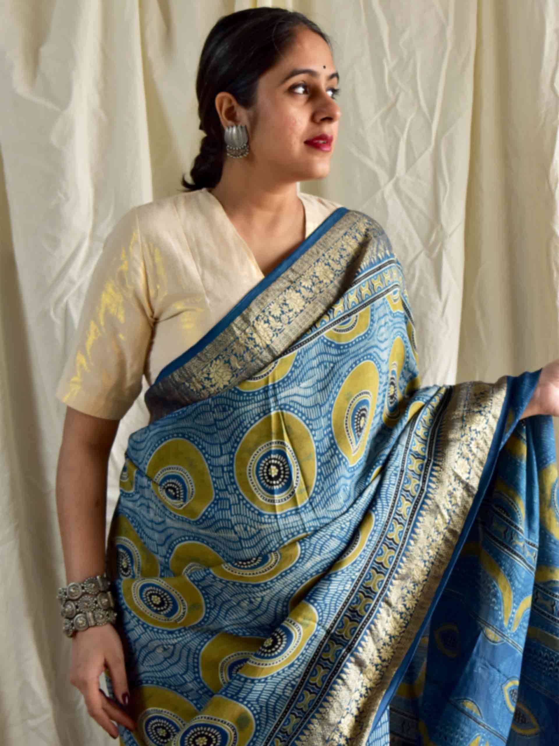 Mona - Ajrakh hand block printed Dola Silk zari border Saree