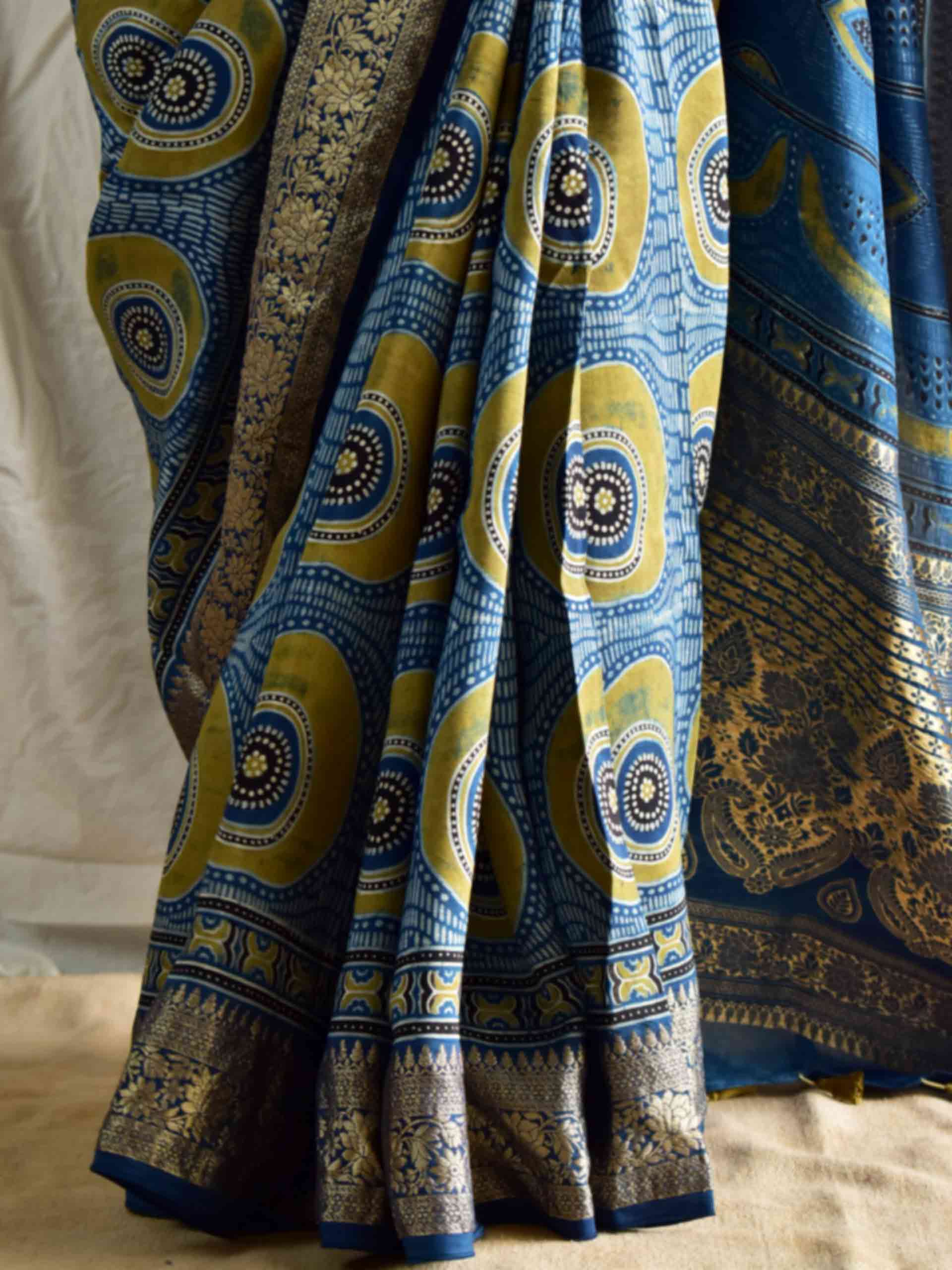 Mona - Ajrakh hand block printed Dola Silk zari border Saree