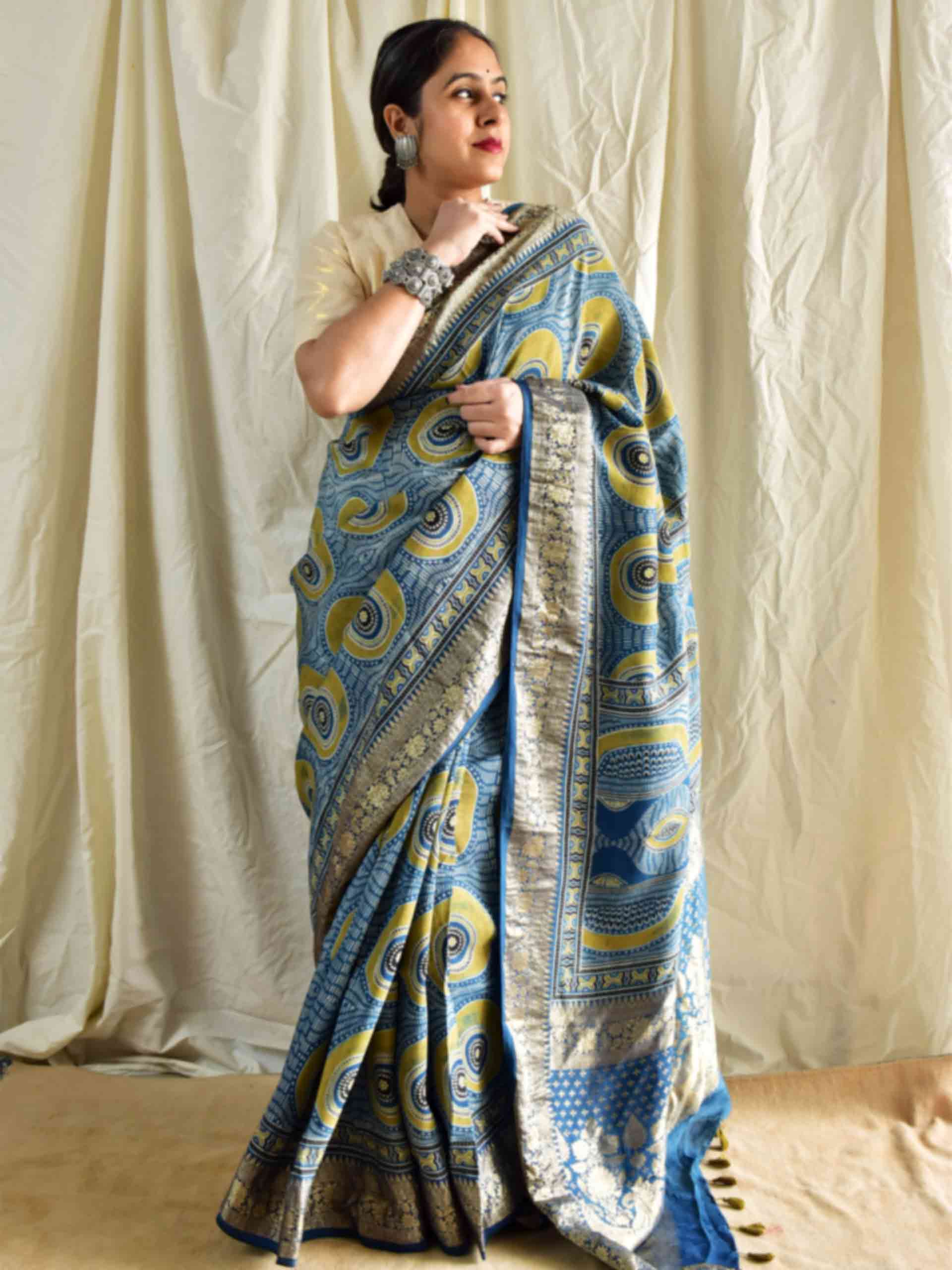 Mona - Ajrakh hand block printed Dola Silk zari border Saree