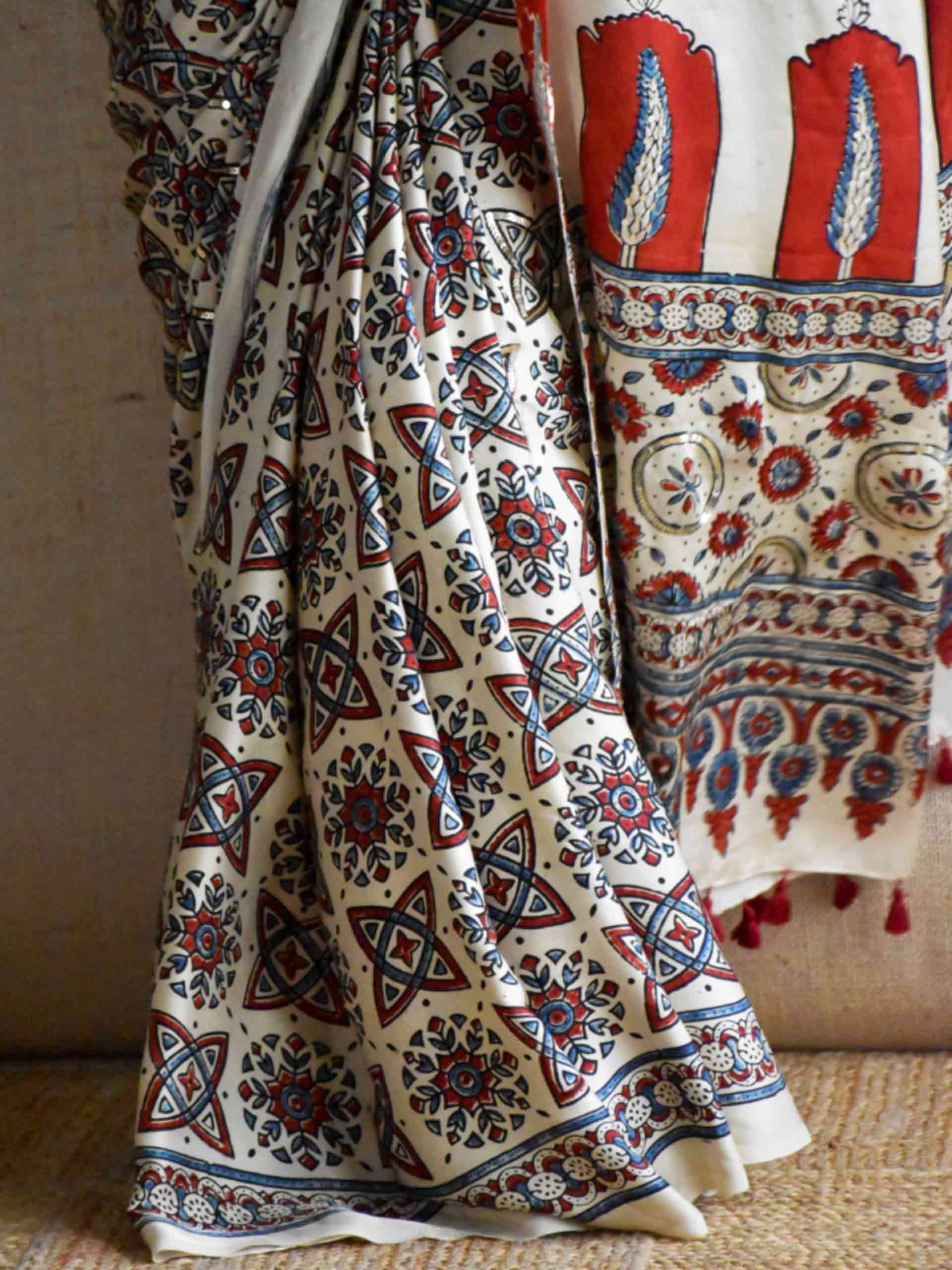 Subh-e-Nazneen - Ajrakh modal Silk hand embroidered Saree