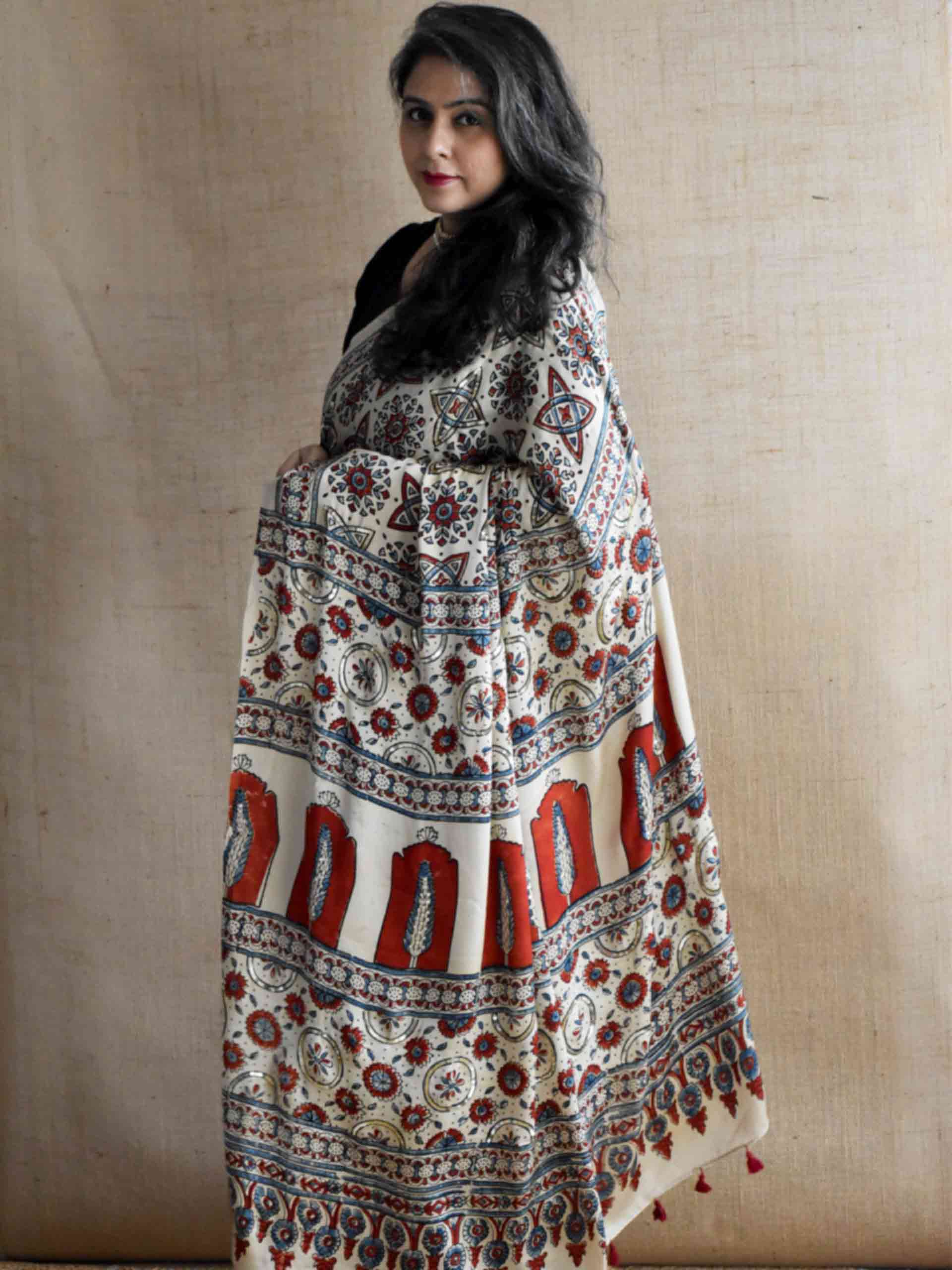 Subh-e-Nazneen - Ajrakh modal Silk hand embroidered Saree