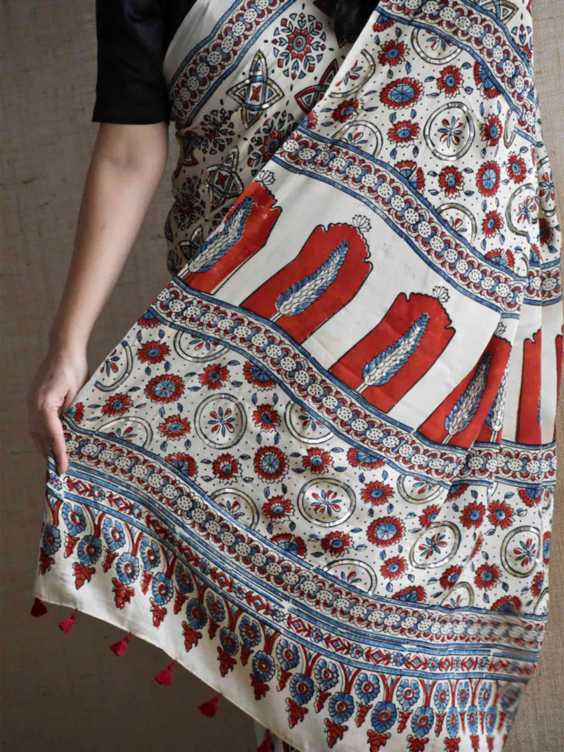 Subh-e-Nazneen - Ajrakh modal Silk hand embroidered Saree