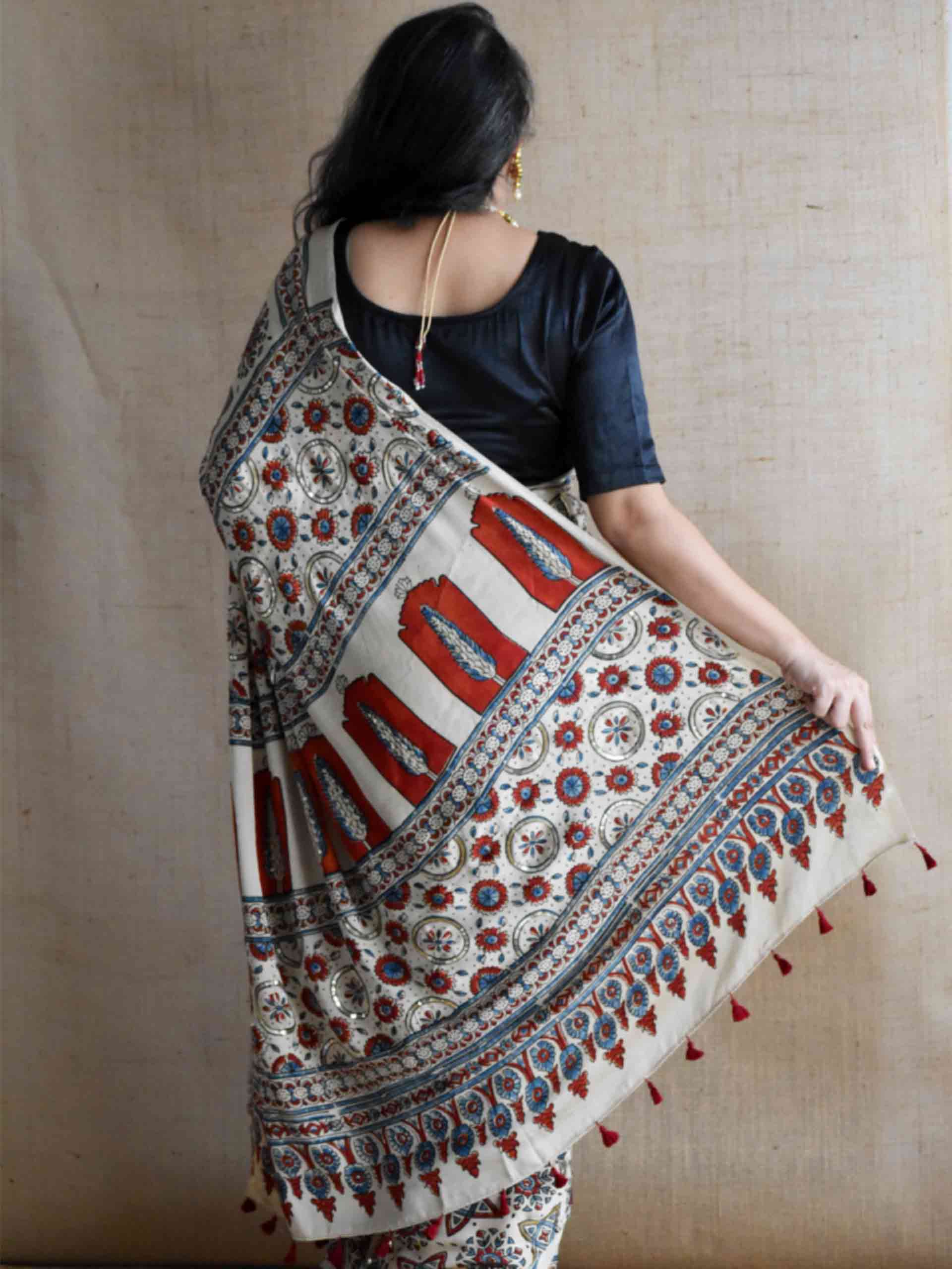 Subh-e-Nazneen - Ajrakh modal Silk hand embroidered Saree