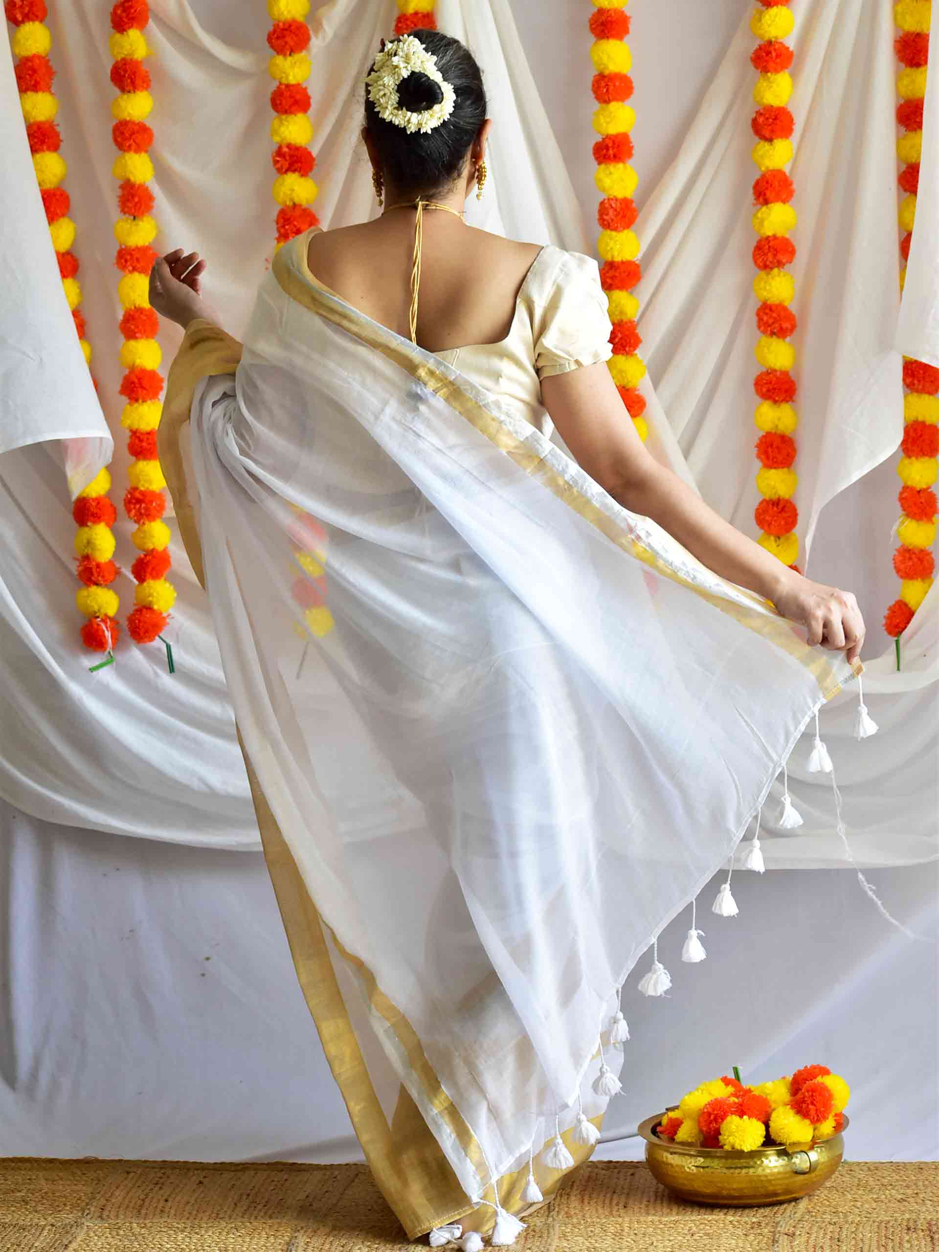 Onappovu - woven zari mul saree