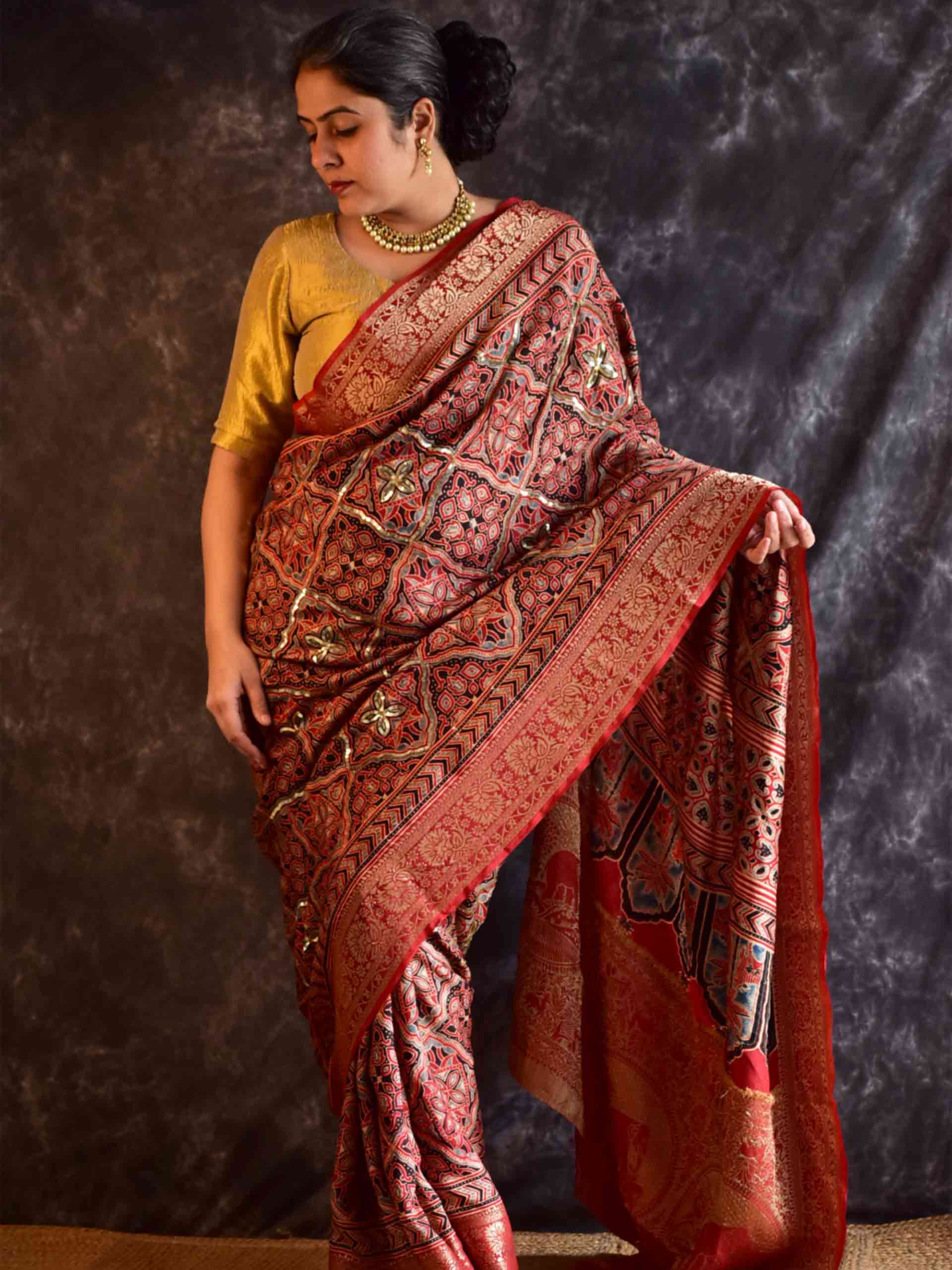 Gehrai - Ajrakh Dola Silk hand embroidered Saree