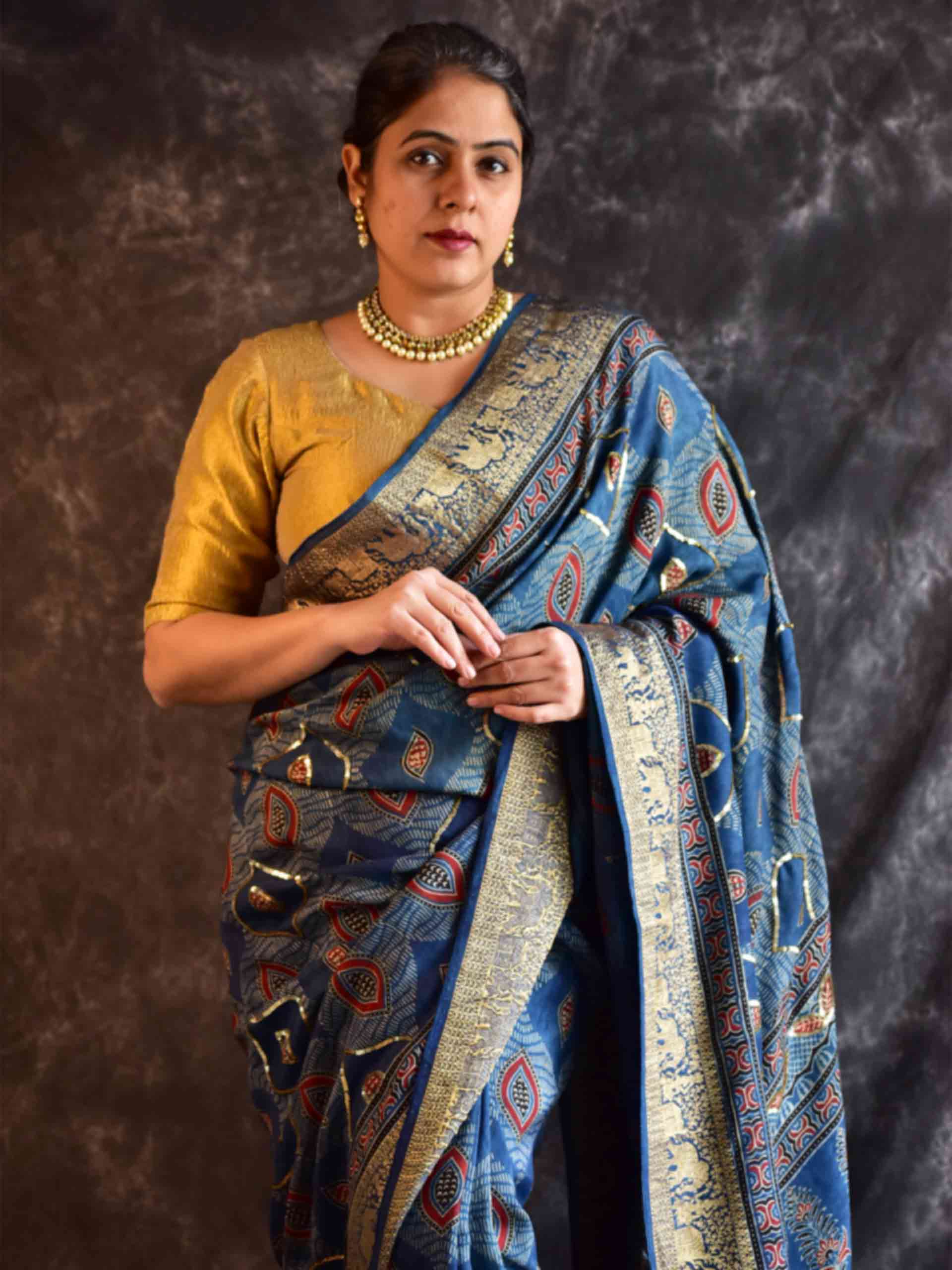 Mor Pankh - Ajrakh Dola Silk hand embroidered Saree