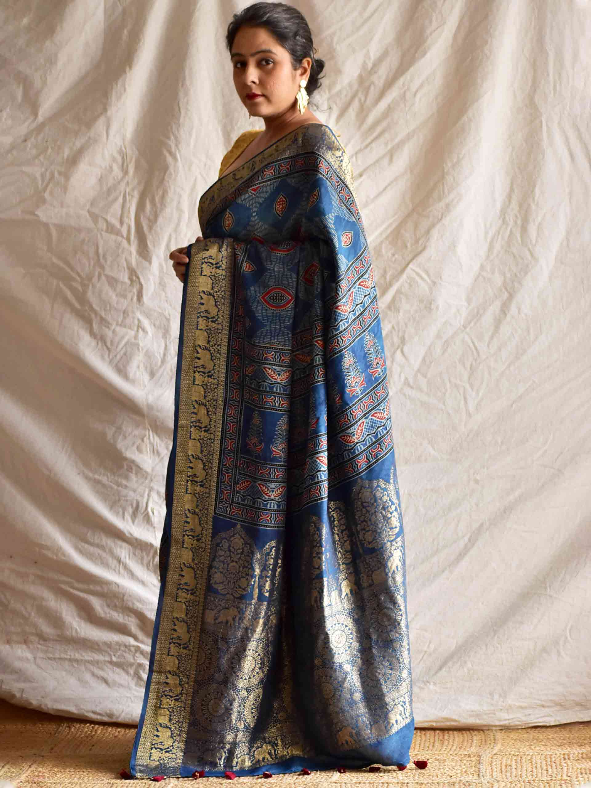 Kareem - Ajrakh hand block printed Dola Silk zari border Saree