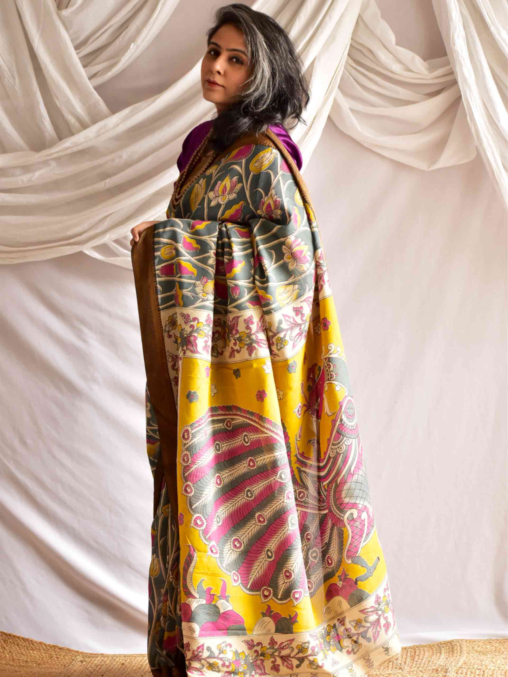 Aakarsh - kalamkari printed Bangalore Silk nizam border saree