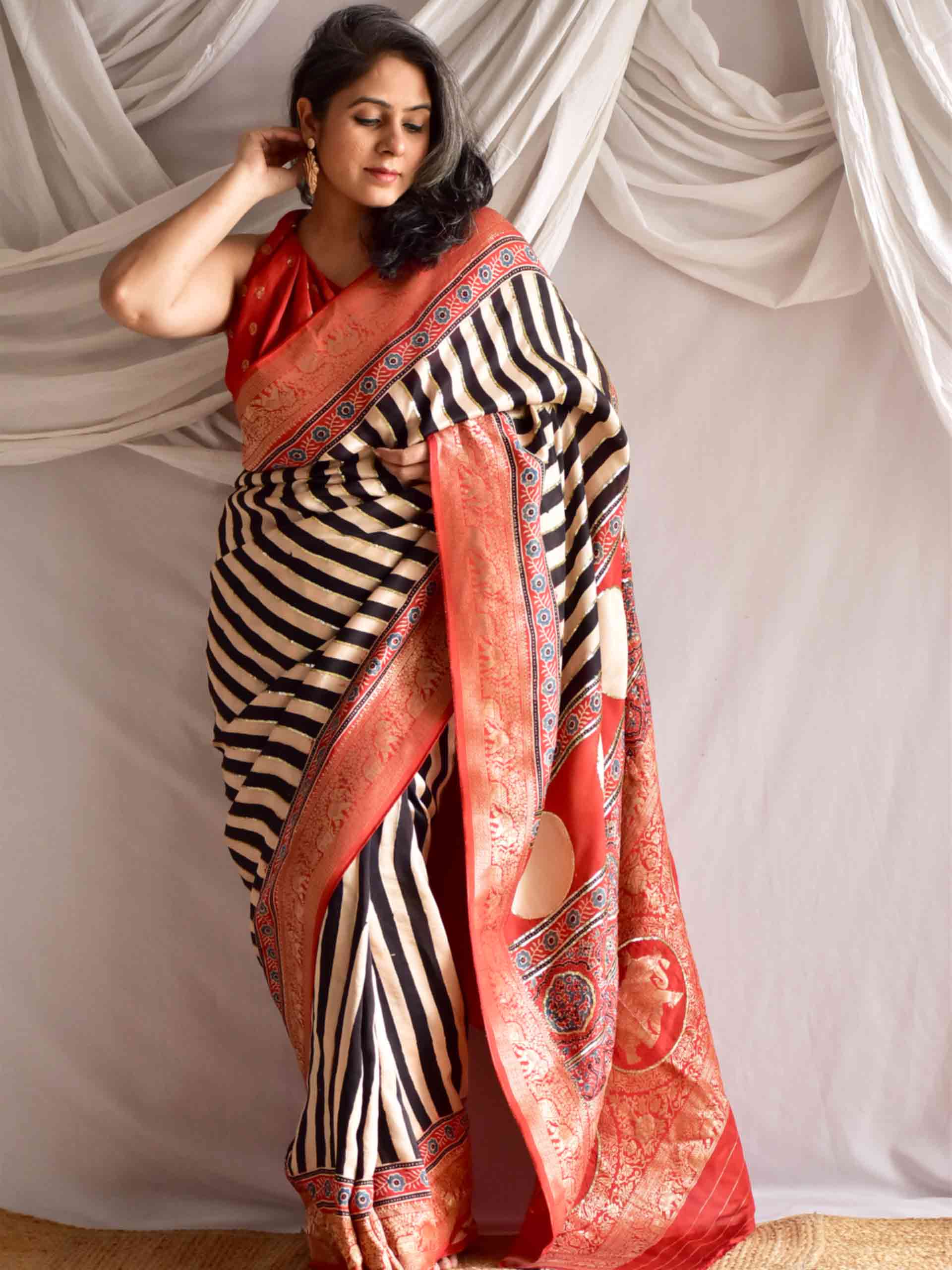 Stripe Beauty - Ajrakh Dola Silk hand embroidered Saree