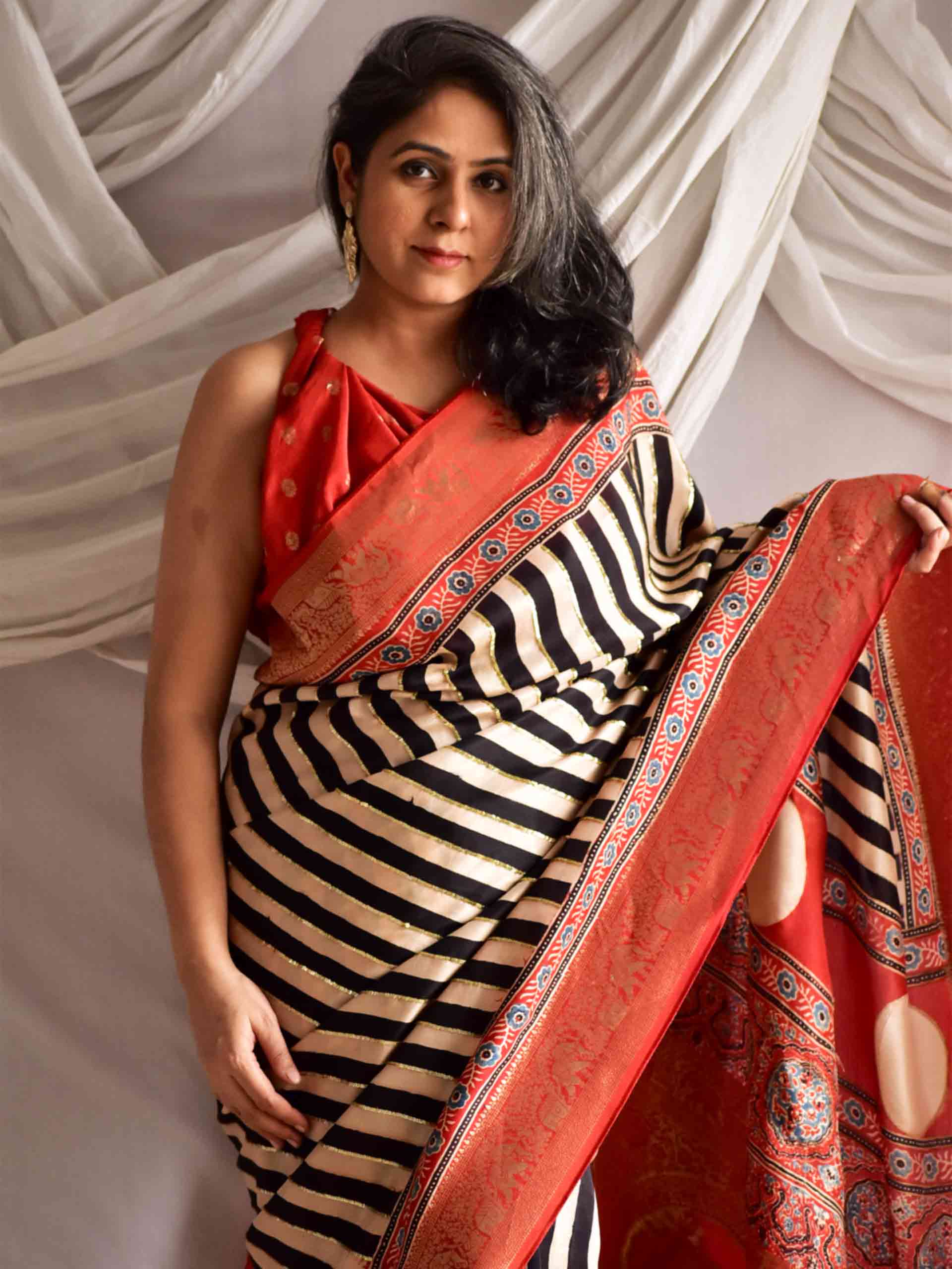 Stripe Beauty - Ajrakh Dola Silk hand embroidered Saree