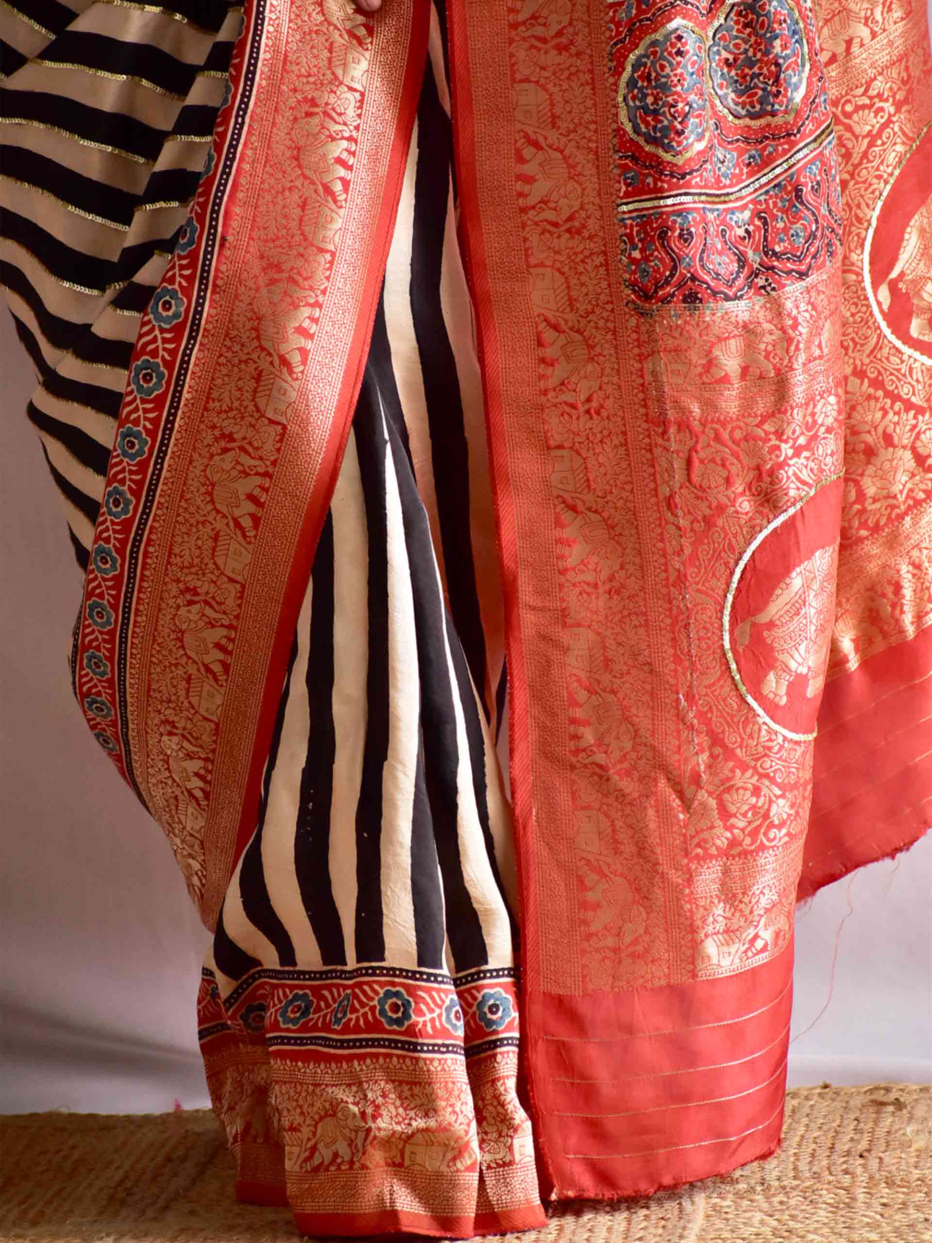 Stripe Beauty - Ajrakh Dola Silk hand embroidered Saree