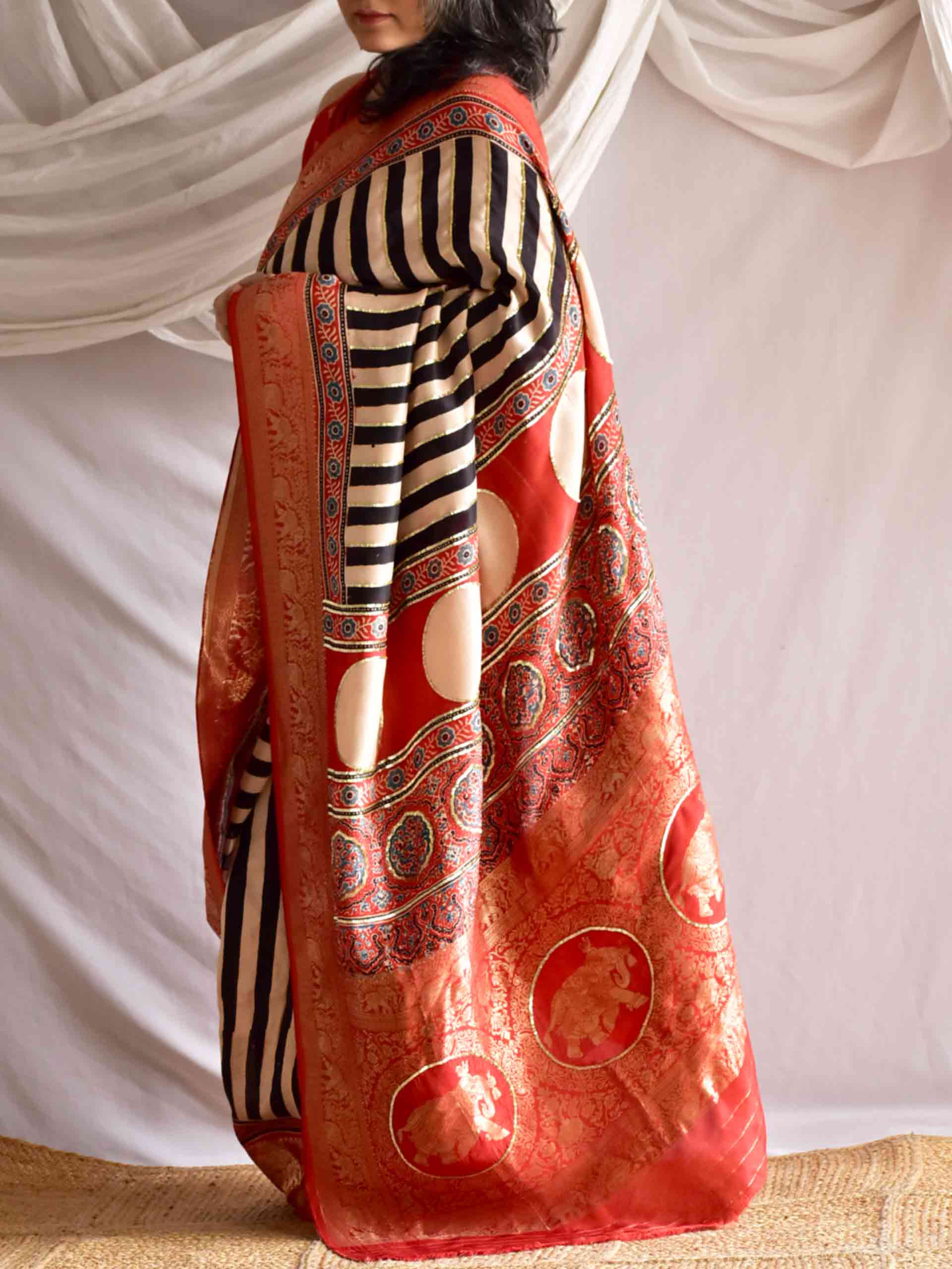 Stripe Beauty - Ajrakh Dola Silk hand embroidered Saree