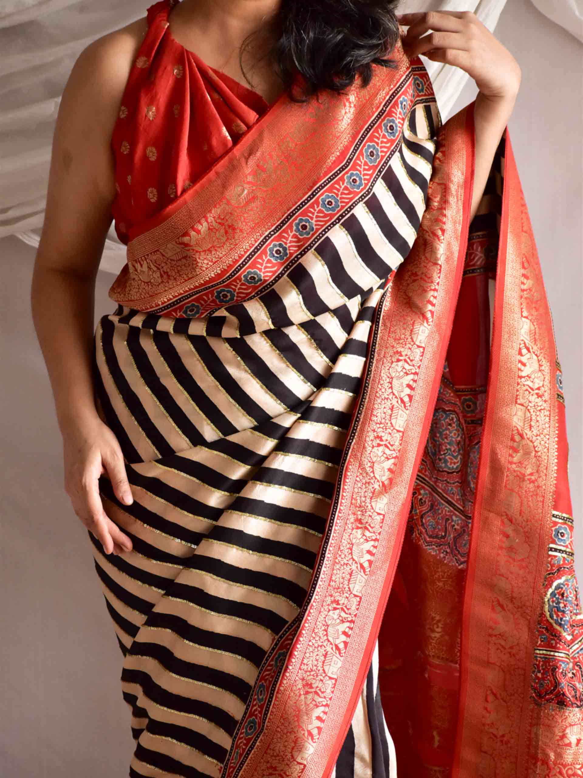 Stripe Beauty - Ajrakh Dola Silk hand embroidered Saree