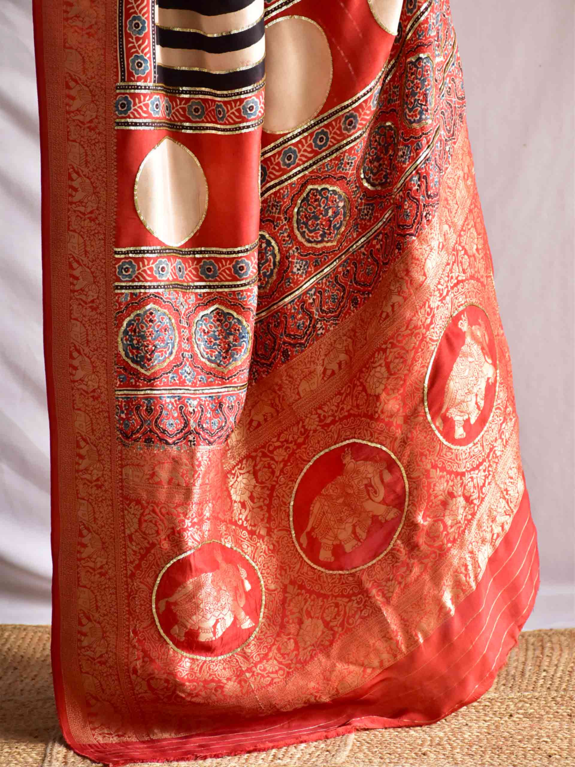 Stripe Beauty - Ajrakh Dola Silk hand embroidered Saree