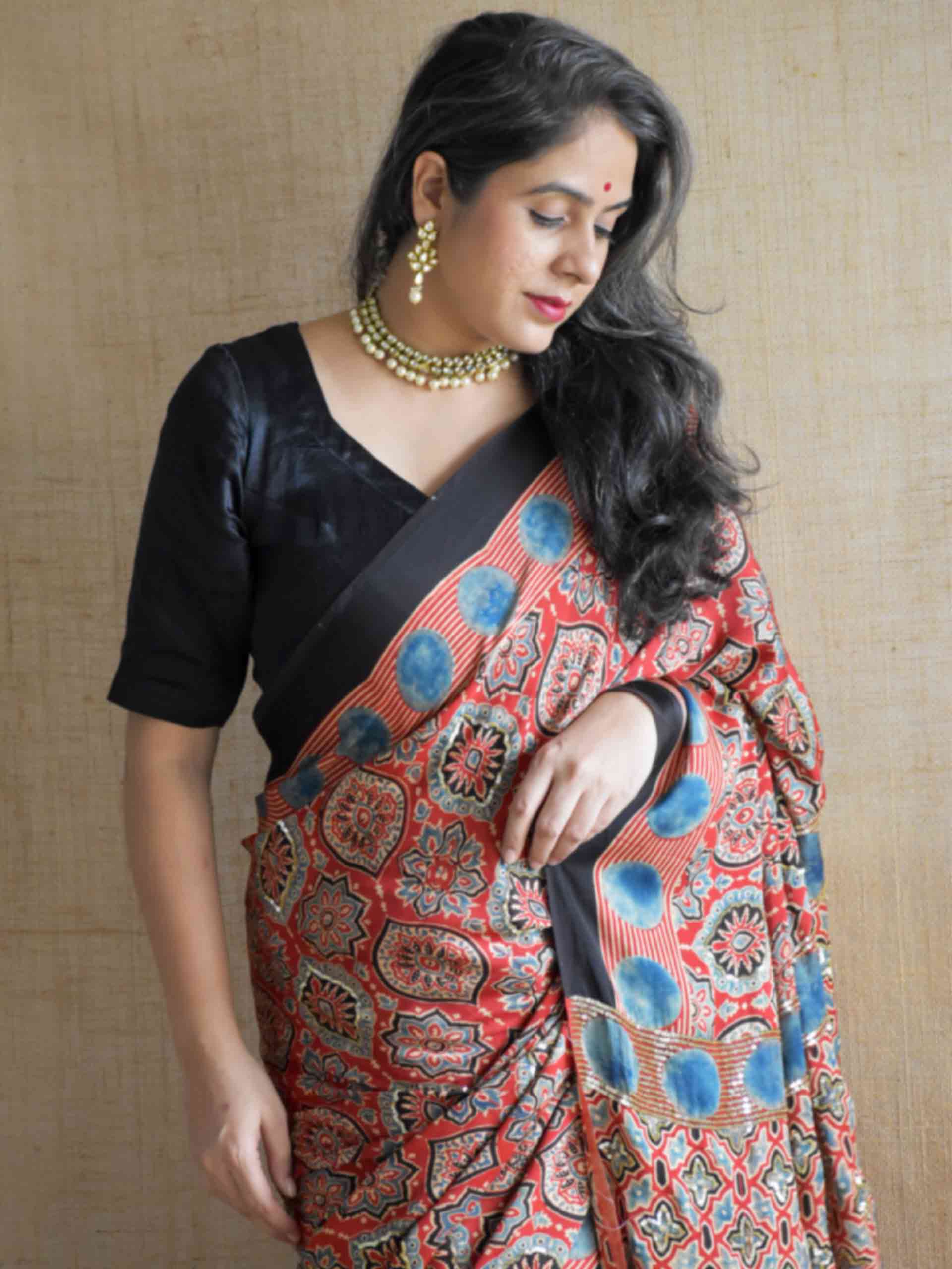 Surkh-e-Gul - Ajrakh modal Silk hand embroidered Saree