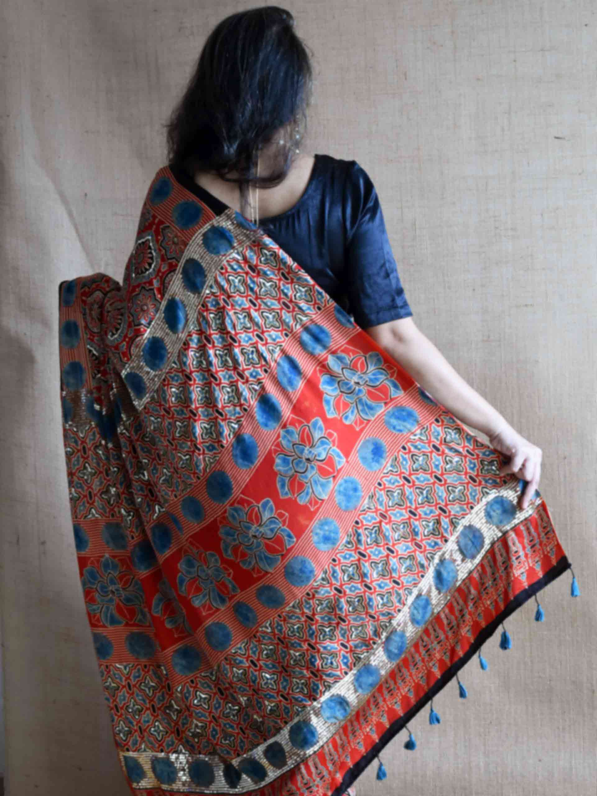 Surkh-e-Gul - Ajrakh modal Silk hand embroidered Saree