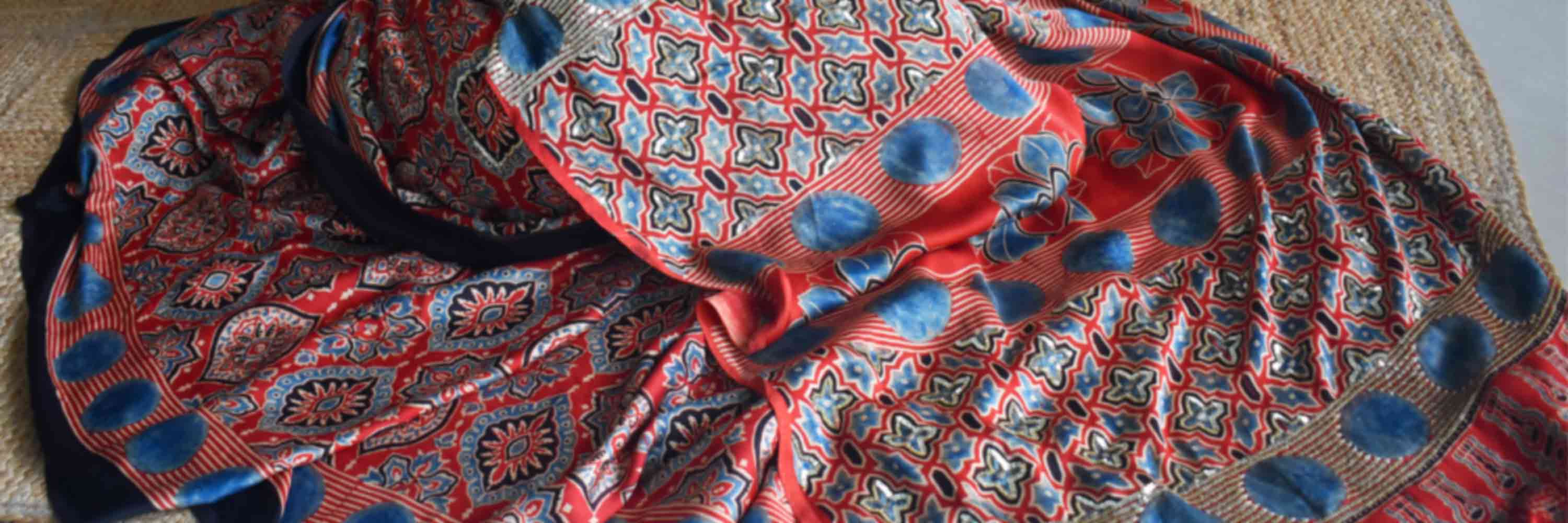 Surkh-e-Gul - Ajrakh modal Silk hand embroidered Saree