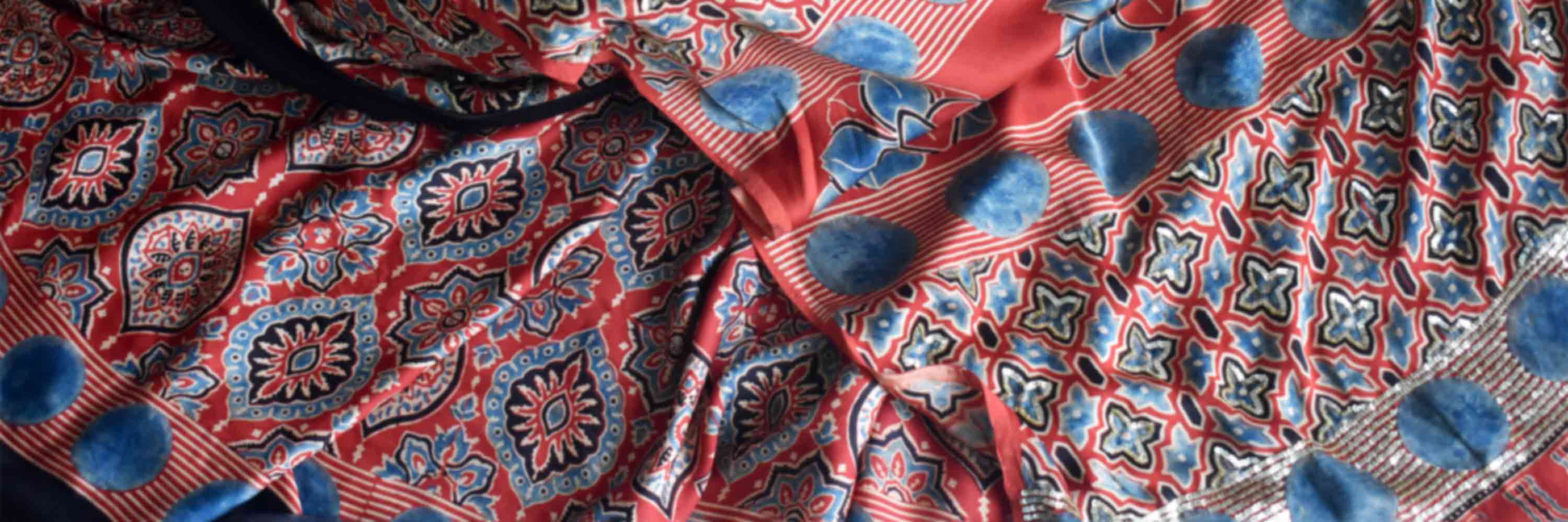 Surkh-e-Gul - Ajrakh modal Silk hand embroidered Saree