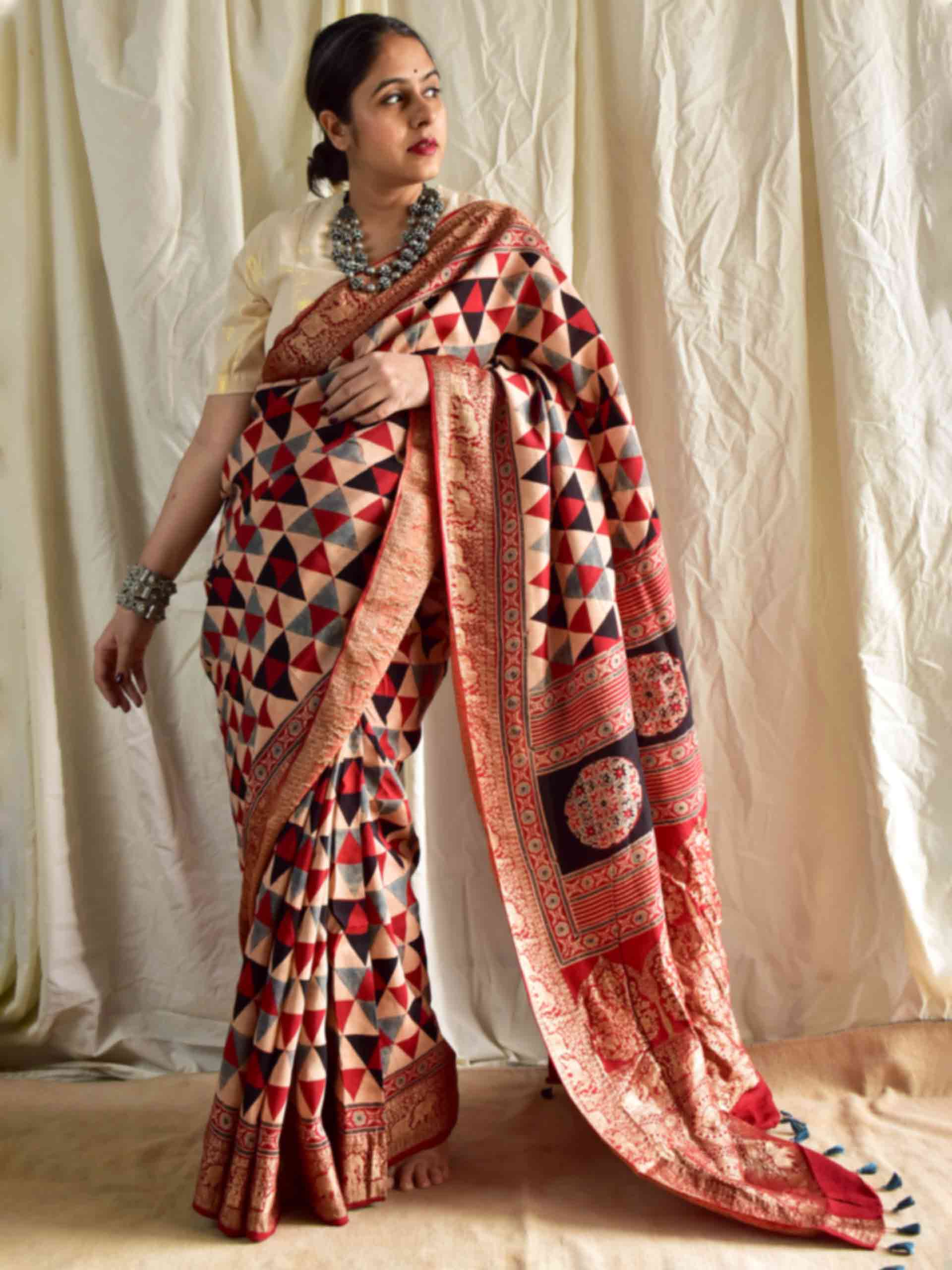 Khwahish - Ajrakh hand block printed Dola Silk zari border Saree