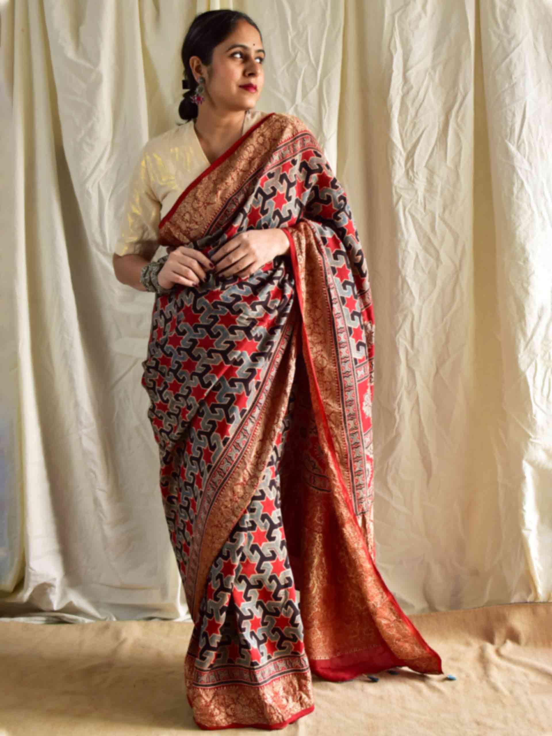 Shabnam - Ajrakh hand block printed Dola Silk zari border Saree
