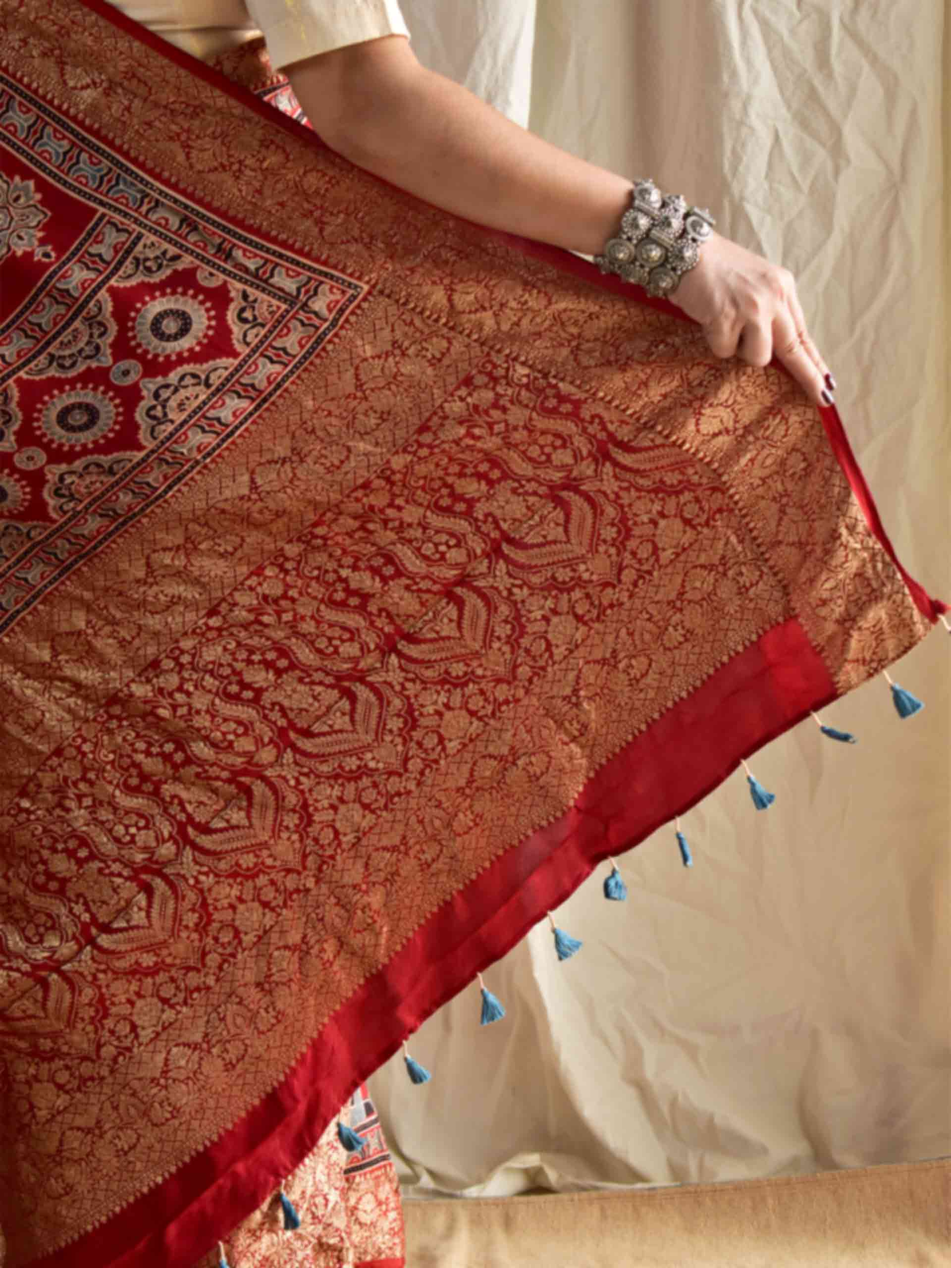 Shabnam - Ajrakh hand block printed Dola Silk zari border Saree