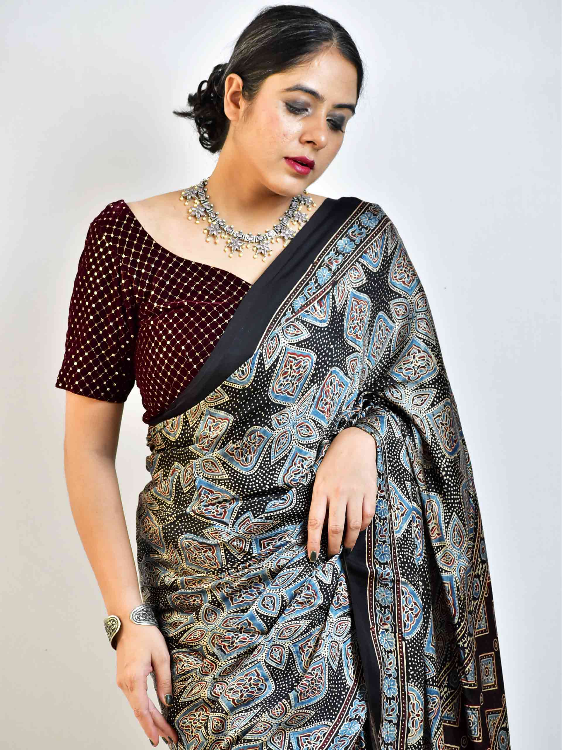 Ajrakh hand block printed Modal Silk Saree with zari pallu