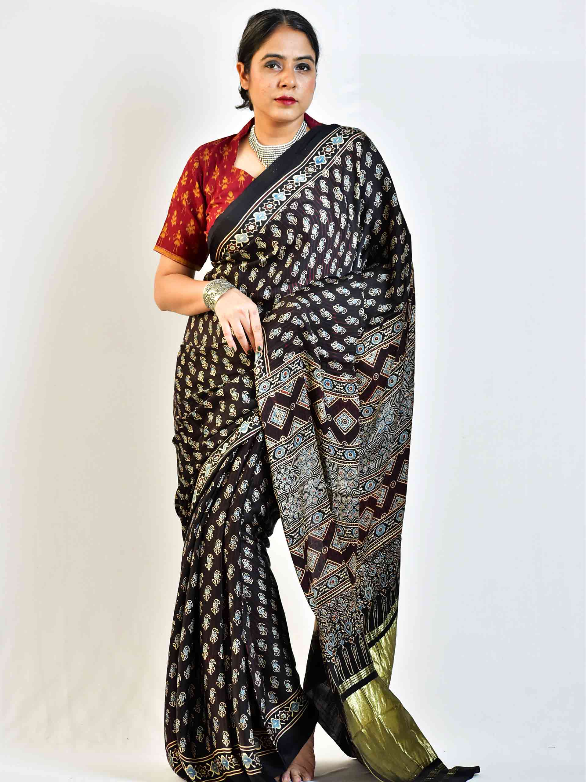 Firefly - Ajrakh hand block printed Modal Silk Saree with zari pallu