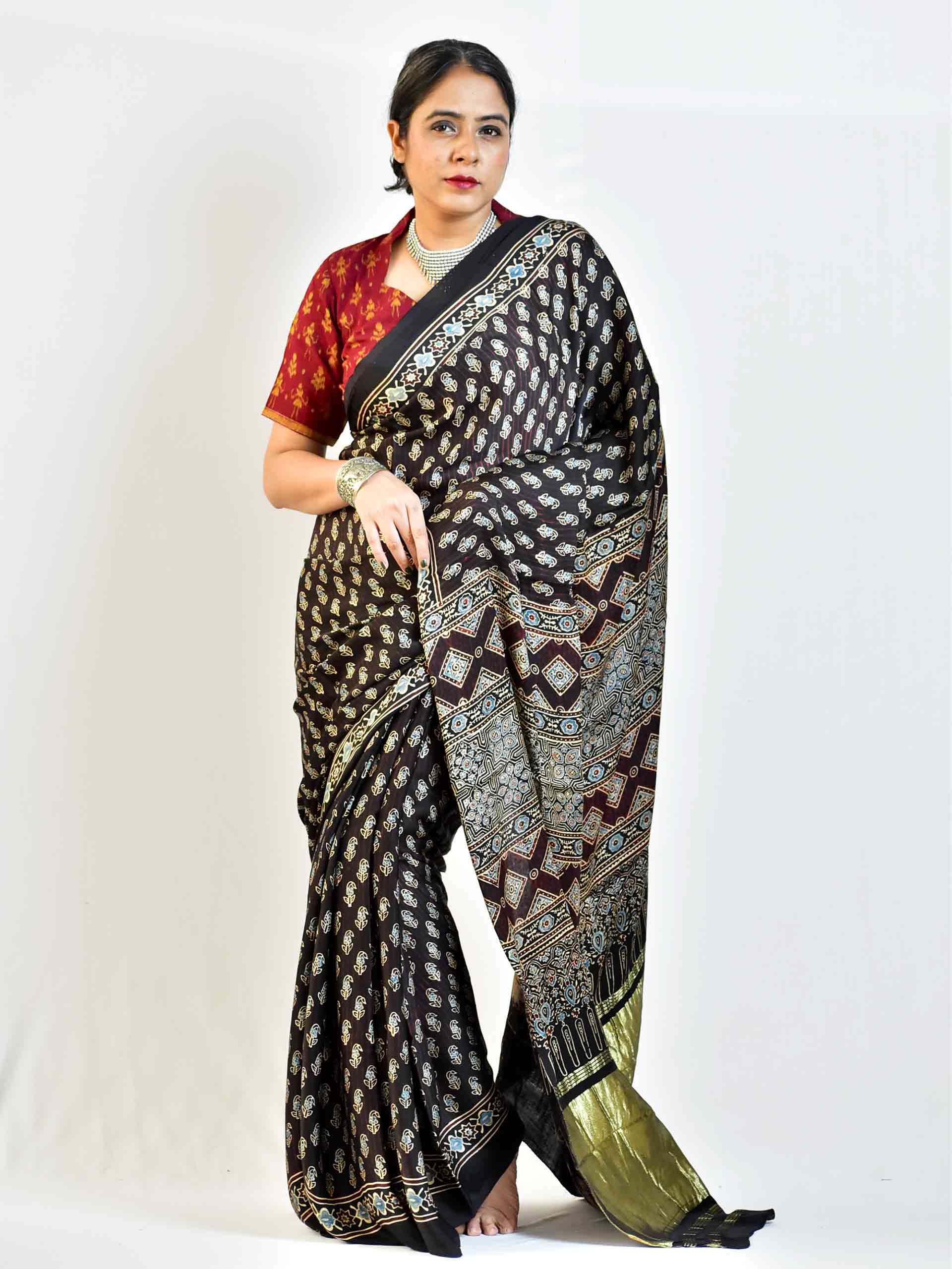 Ajrakh hand block printed Modal Silk Saree with zari pallu