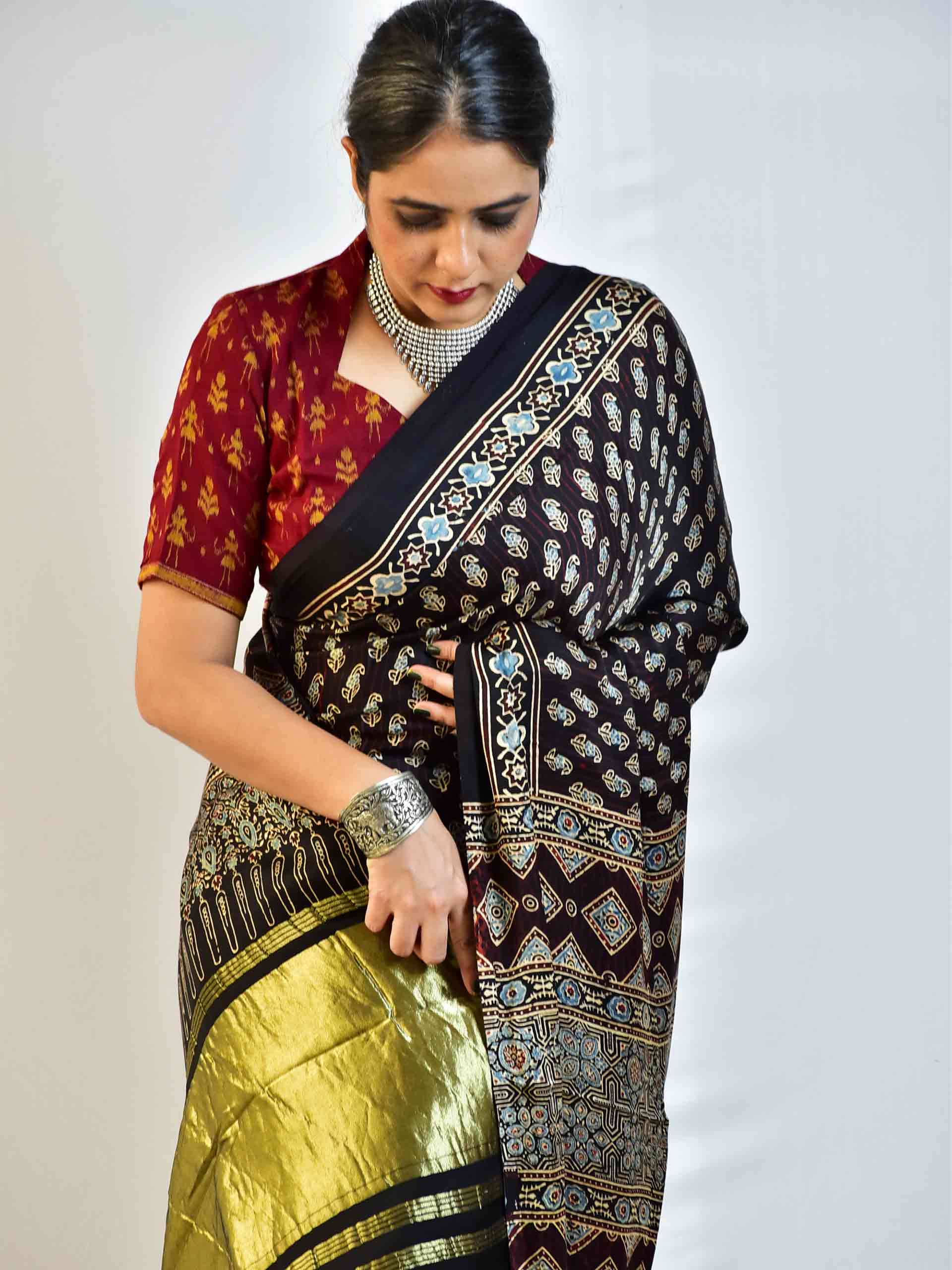 Firefly - Ajrakh hand block printed Modal Silk Saree with zari pallu