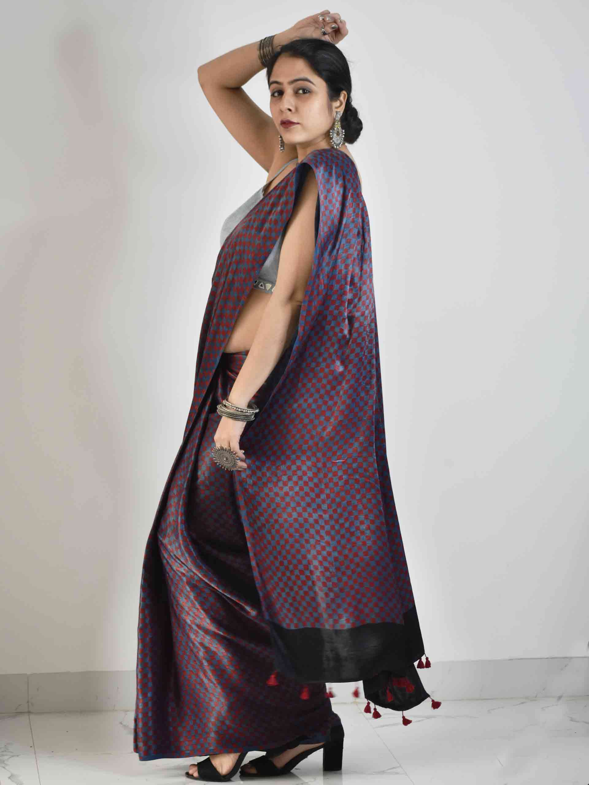 Ajrakh mashru silk saree pose at home