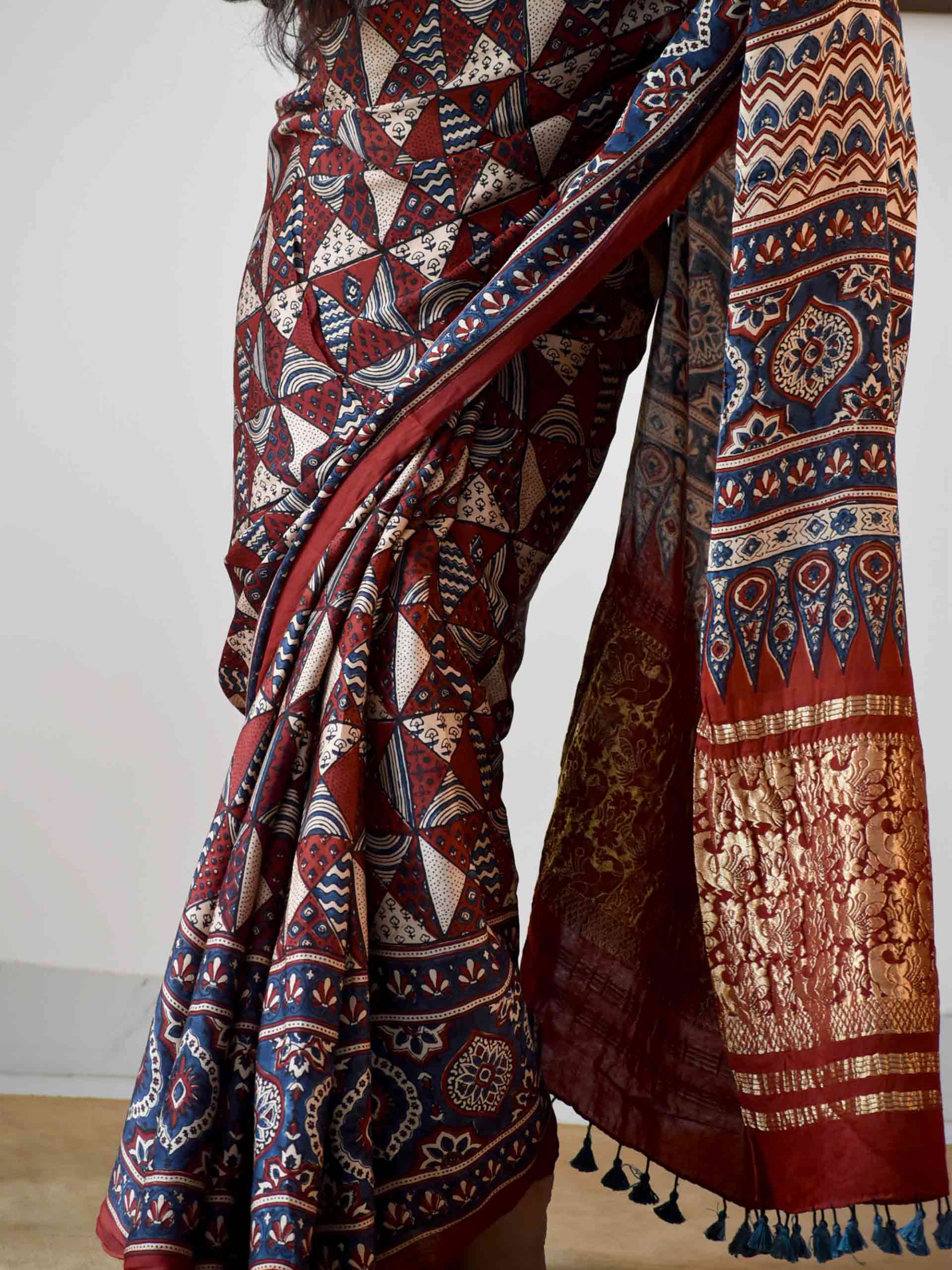 Ajrakh hand block printed Modal Silk Saree with zari pallu