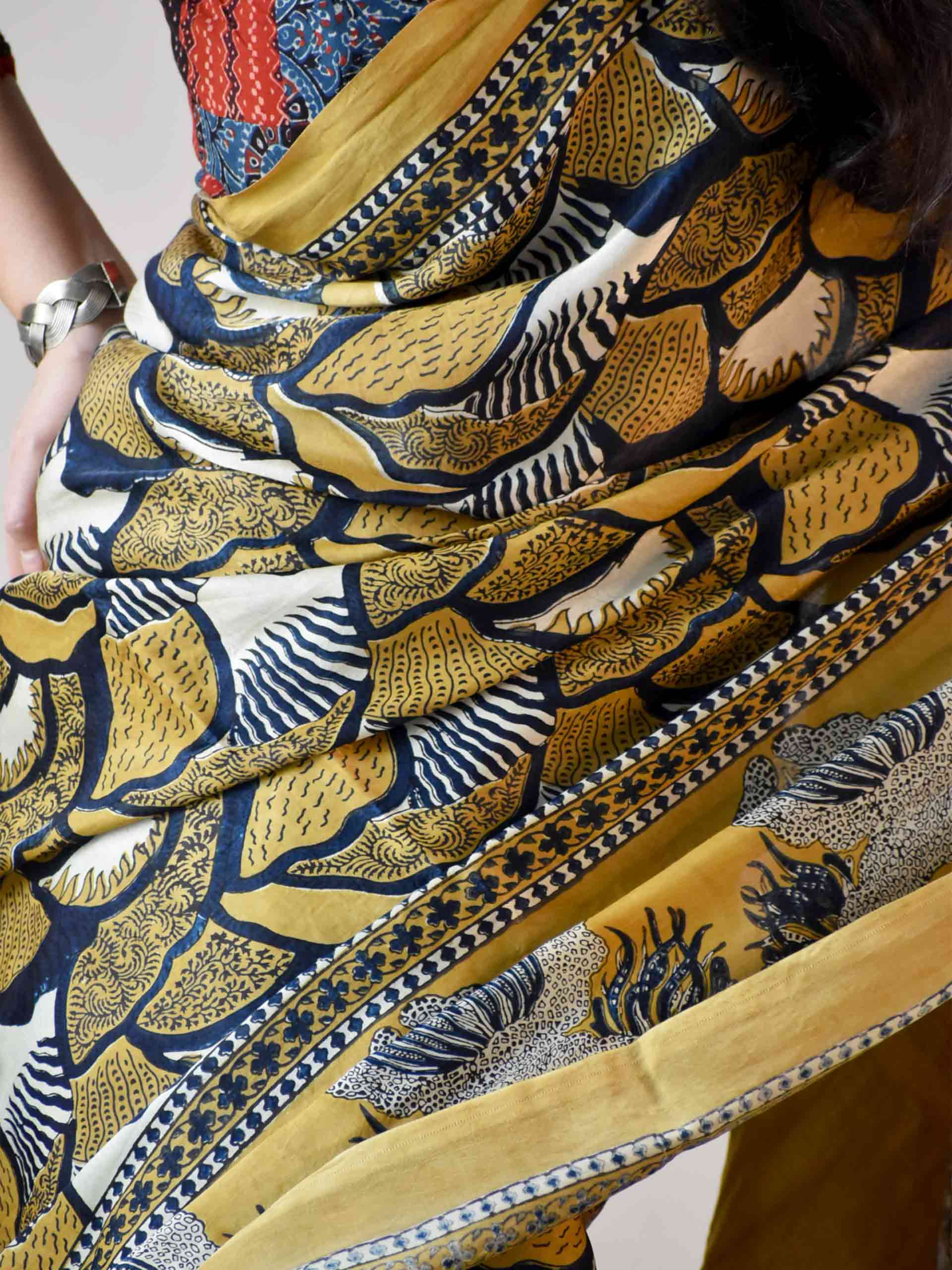 Ajrakh hand block printed Modal Silk Saree with zari pallu