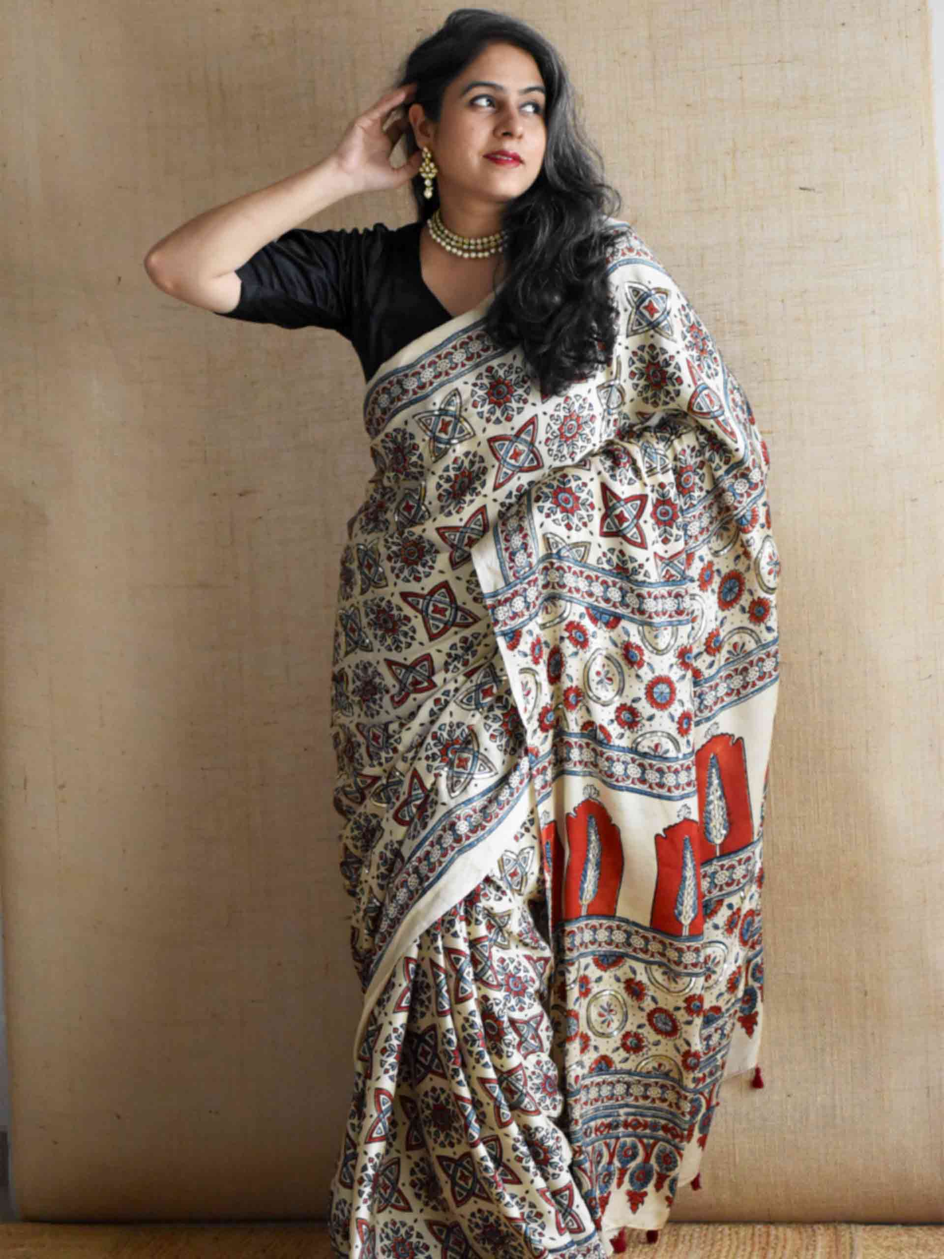 Subh-e-Nazneen - Ajrakh modal Silk hand embroidered Saree
