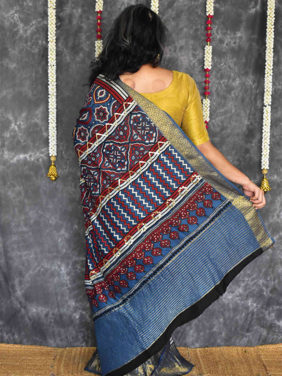 Saawari - Ajrakh Dola Silk hand embroidered Saree