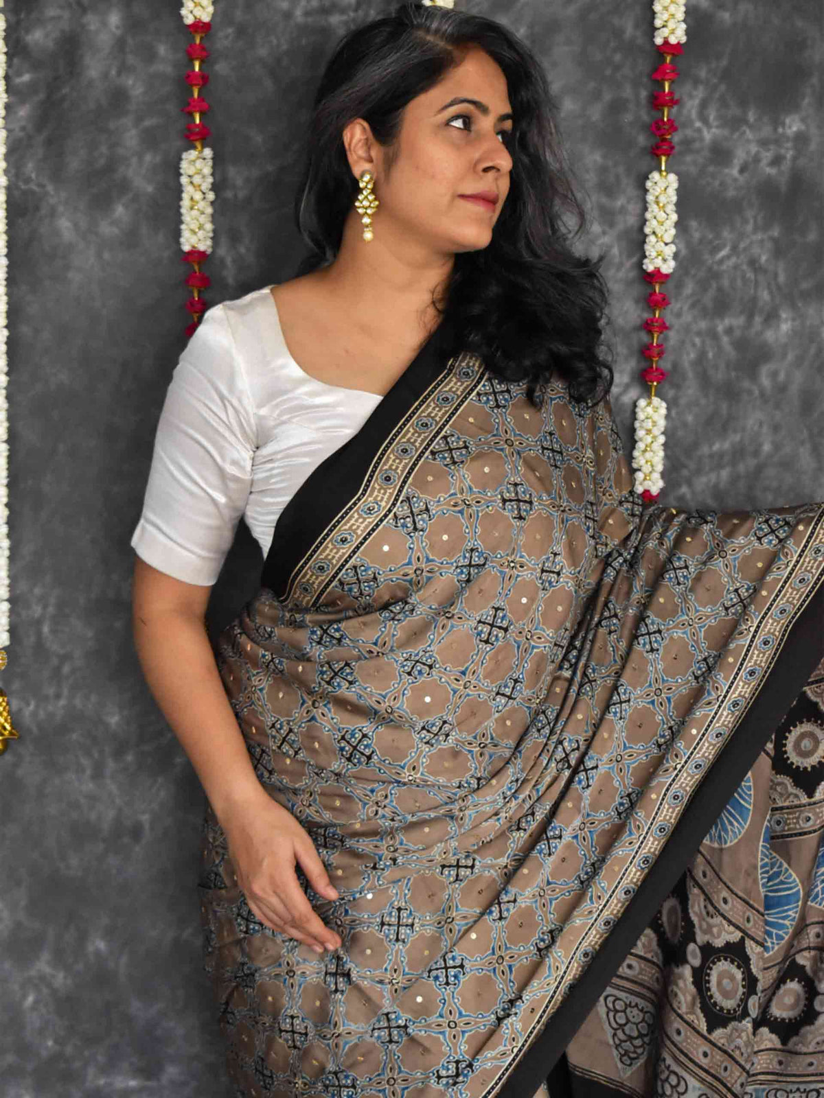 Kashish - Ajrakh modal Silk hand embroidered Saree