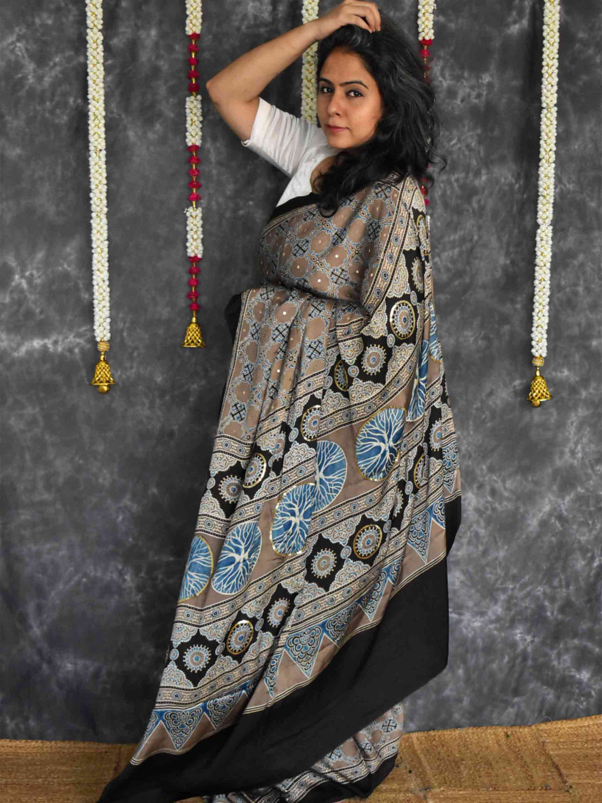 Kashish - Ajrakh modal Silk hand embroidered Saree
