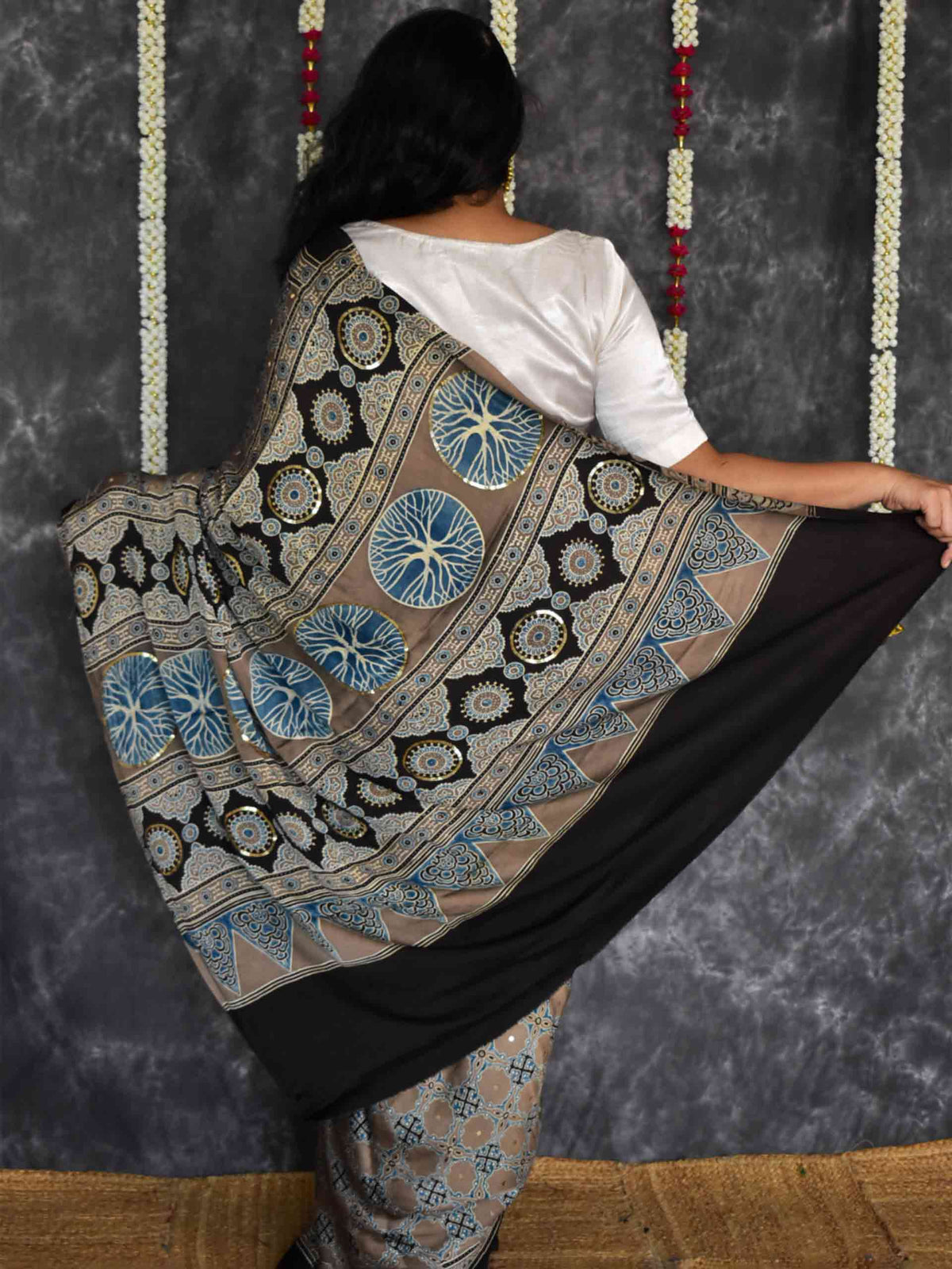 Kashish - Ajrakh modal Silk hand embroidered Saree