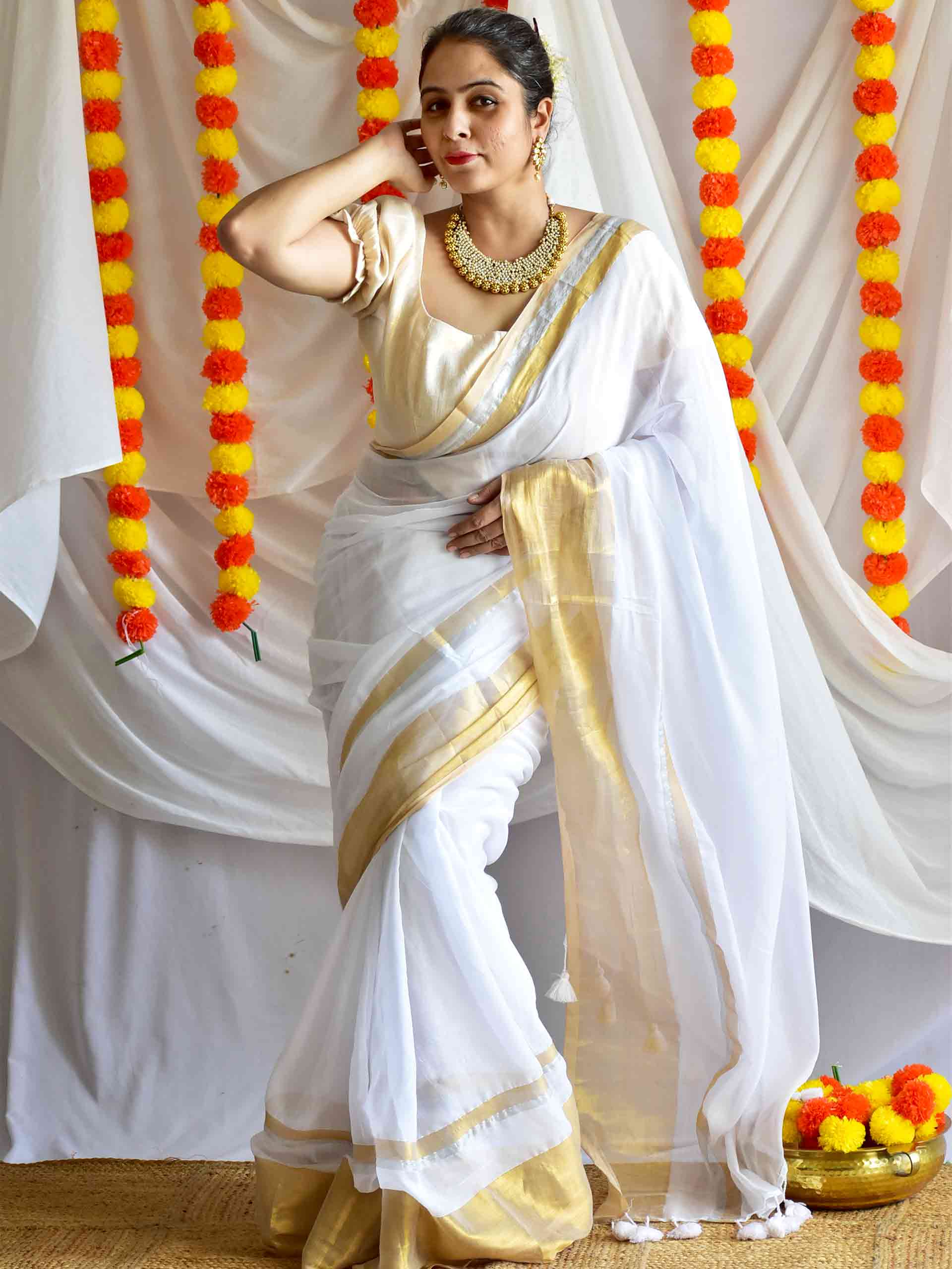 Onappovu - woven zari mul saree