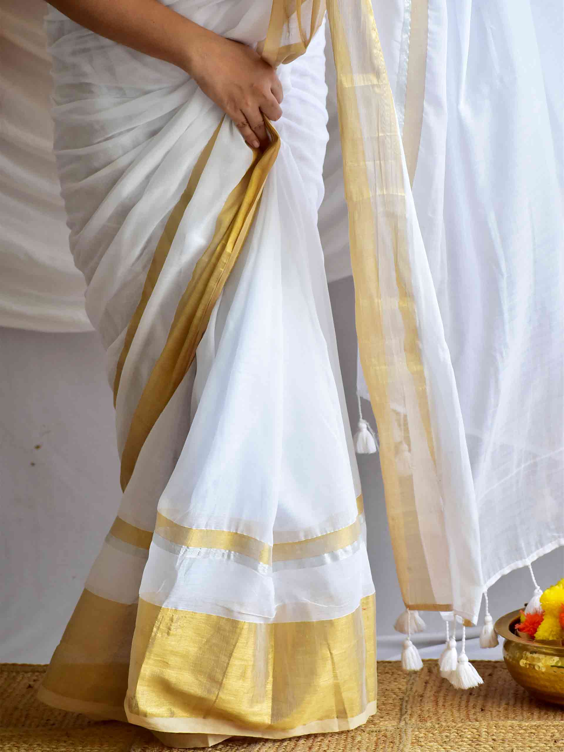 Onappovu - woven zari mul saree
