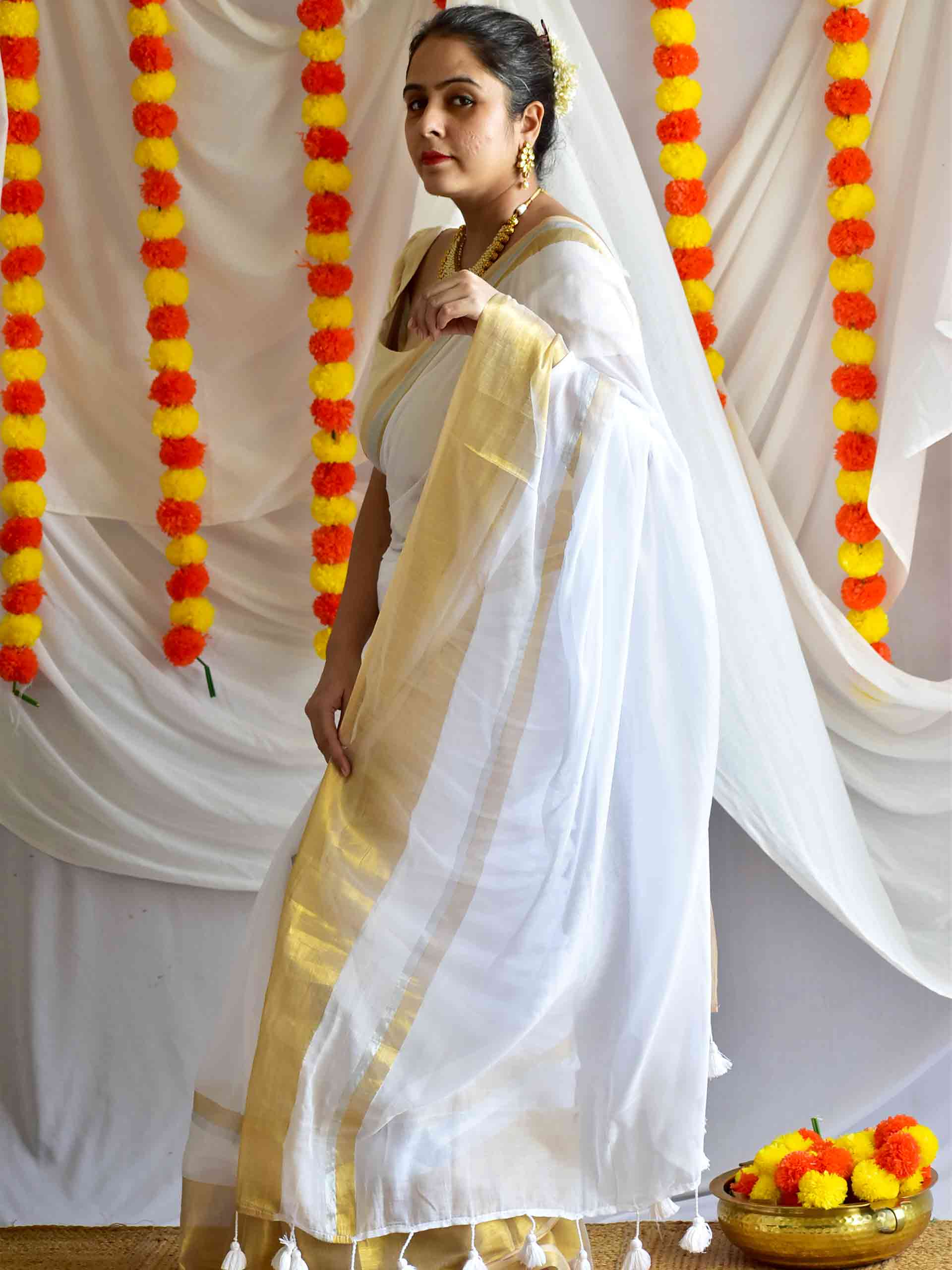 Onappovu - woven zari mul saree