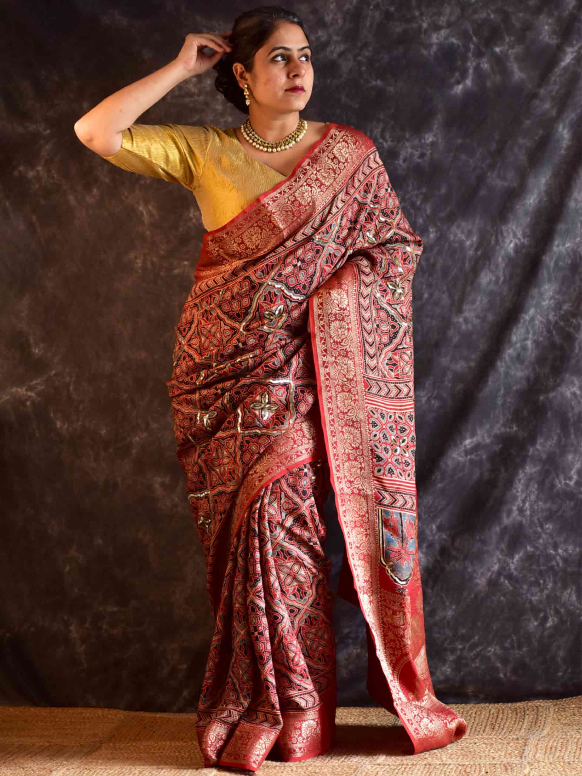 Gehrai - Ajrakh Dola Silk hand embroidered Saree