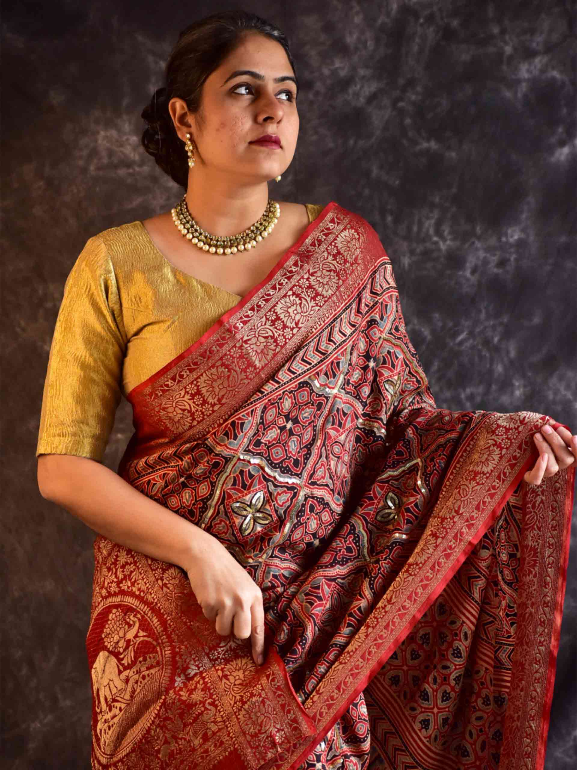 Gehrai - Ajrakh Dola Silk hand embroidered Saree