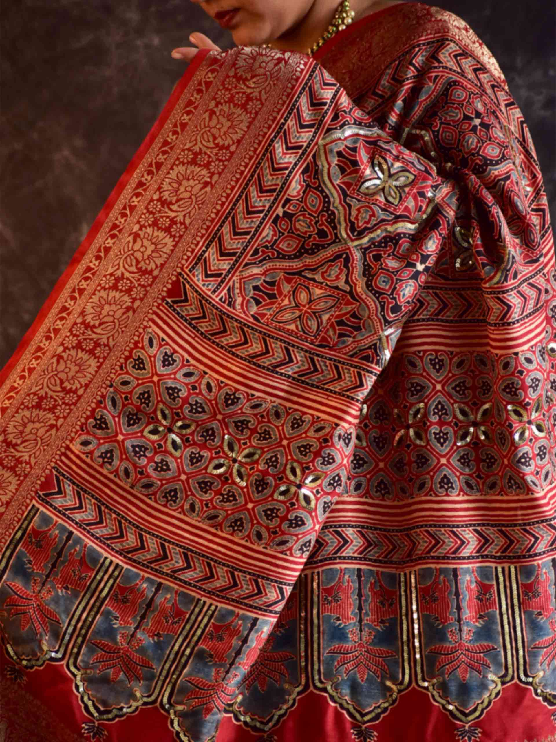 Gehrai - Ajrakh Dola Silk hand embroidered Saree