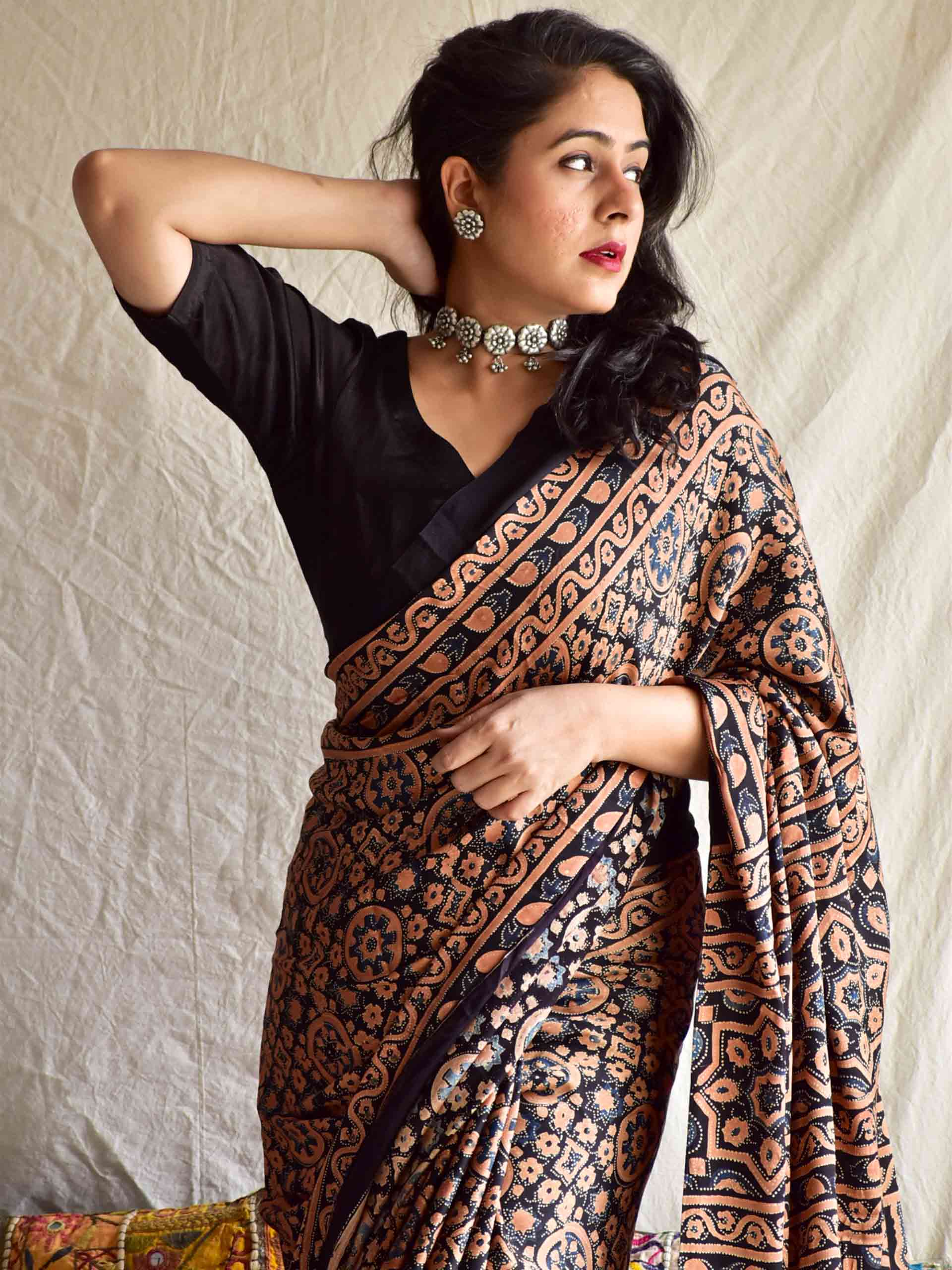 Nexa - Ajrakh hand block printed Modal Silk Saree with zari pallu