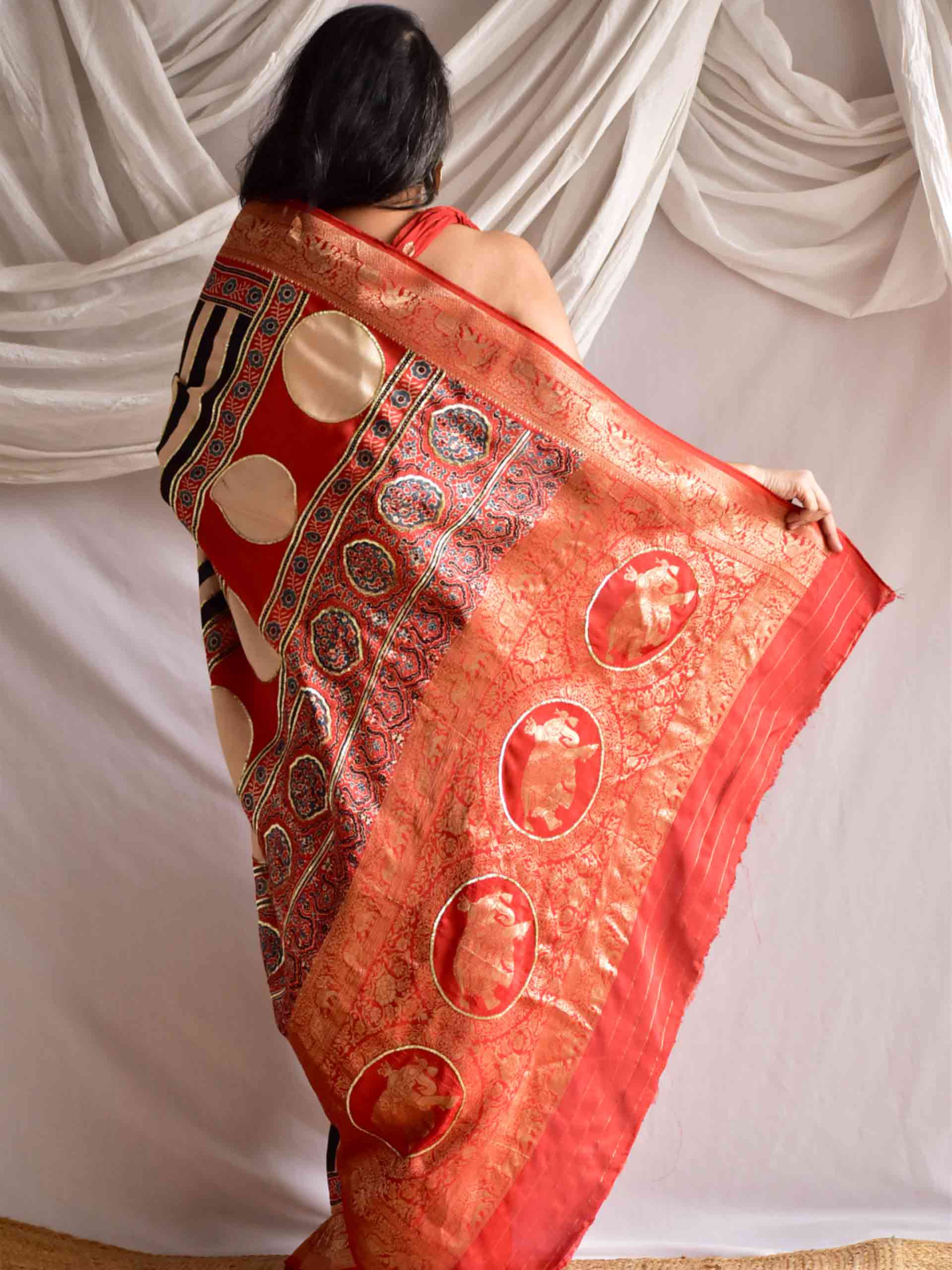 Stripe Beauty - Ajrakh Dola Silk hand embroidered Saree