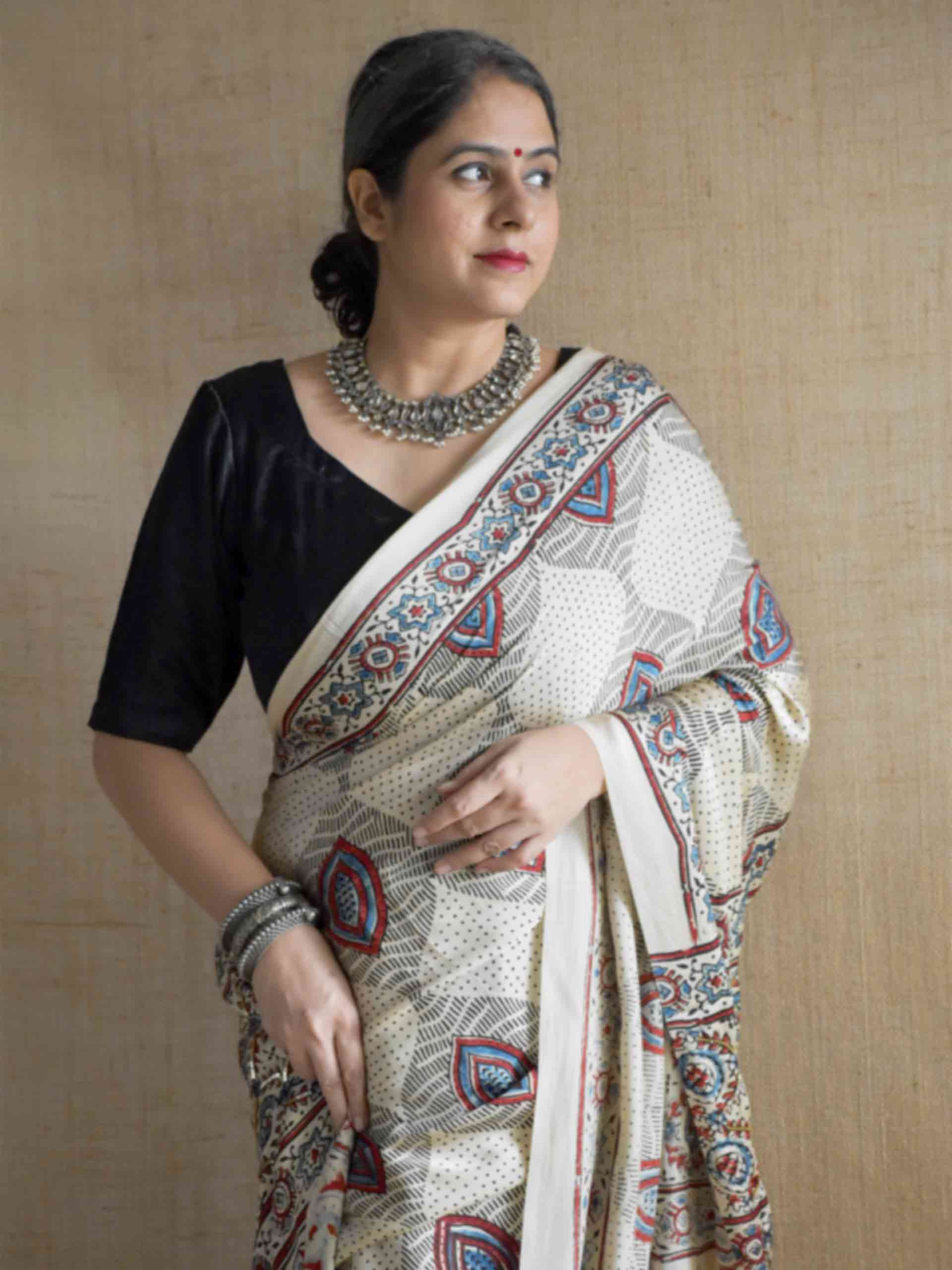 Nazm - Ajrakh modal Silk hand embroidered Saree