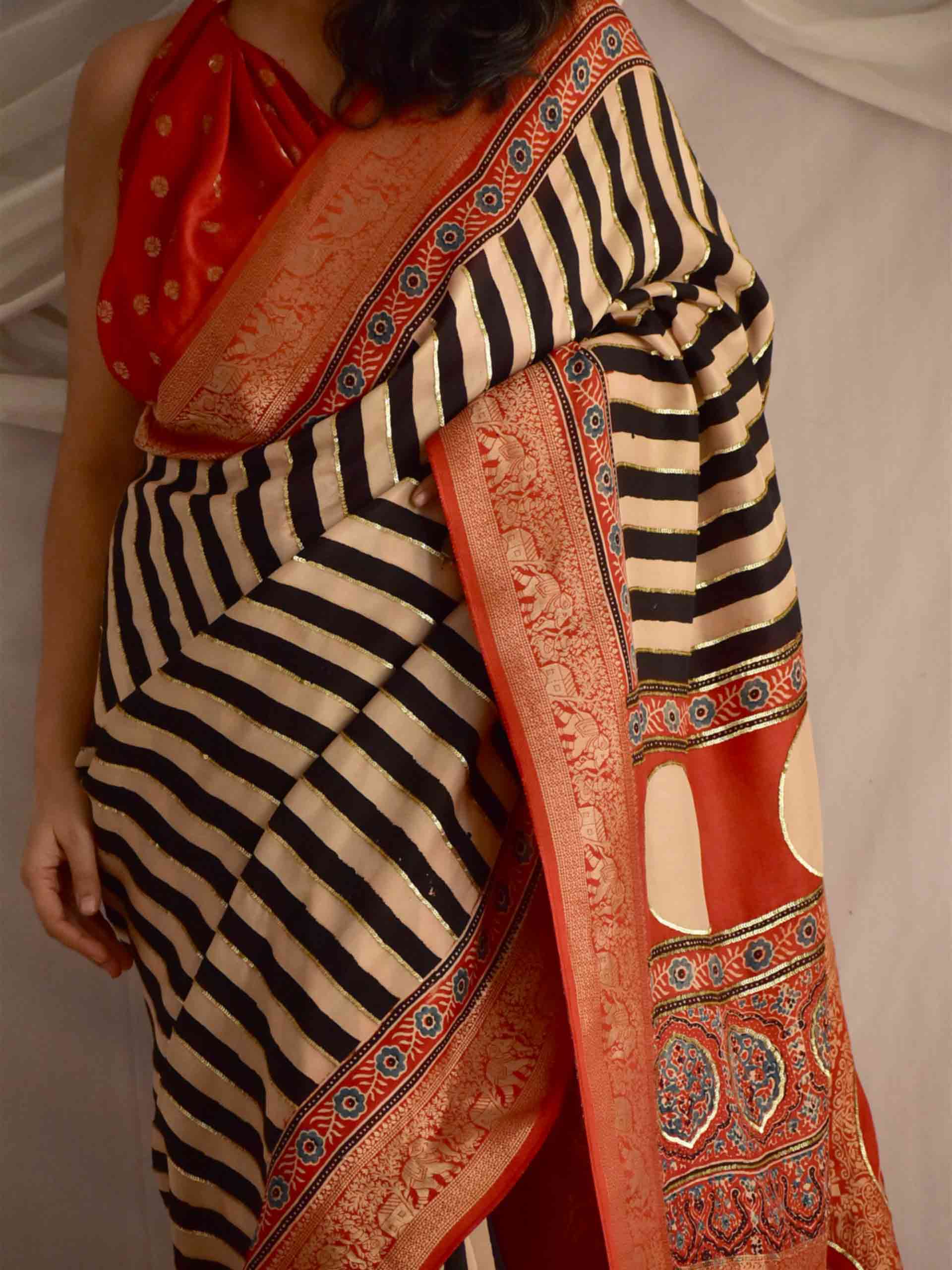Stripe Beauty - Ajrakh Dola Silk hand embroidered Saree