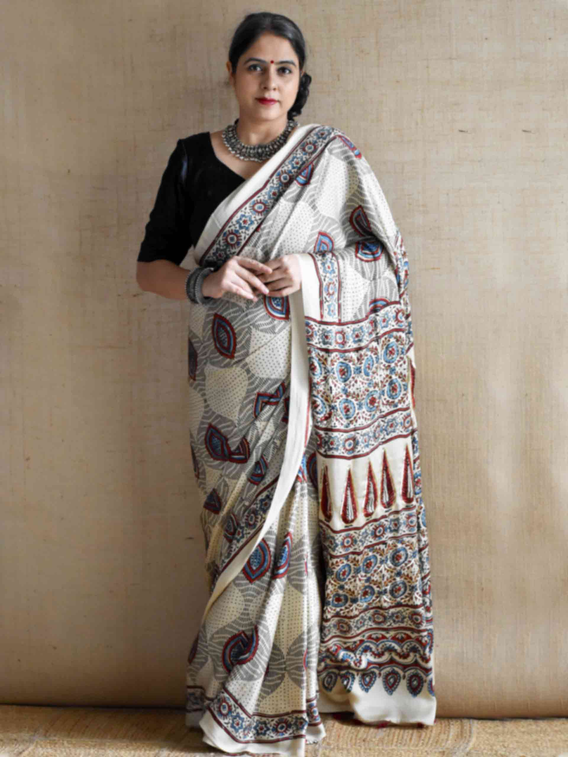 Nazm - Ajrakh modal Silk hand embroidered Saree