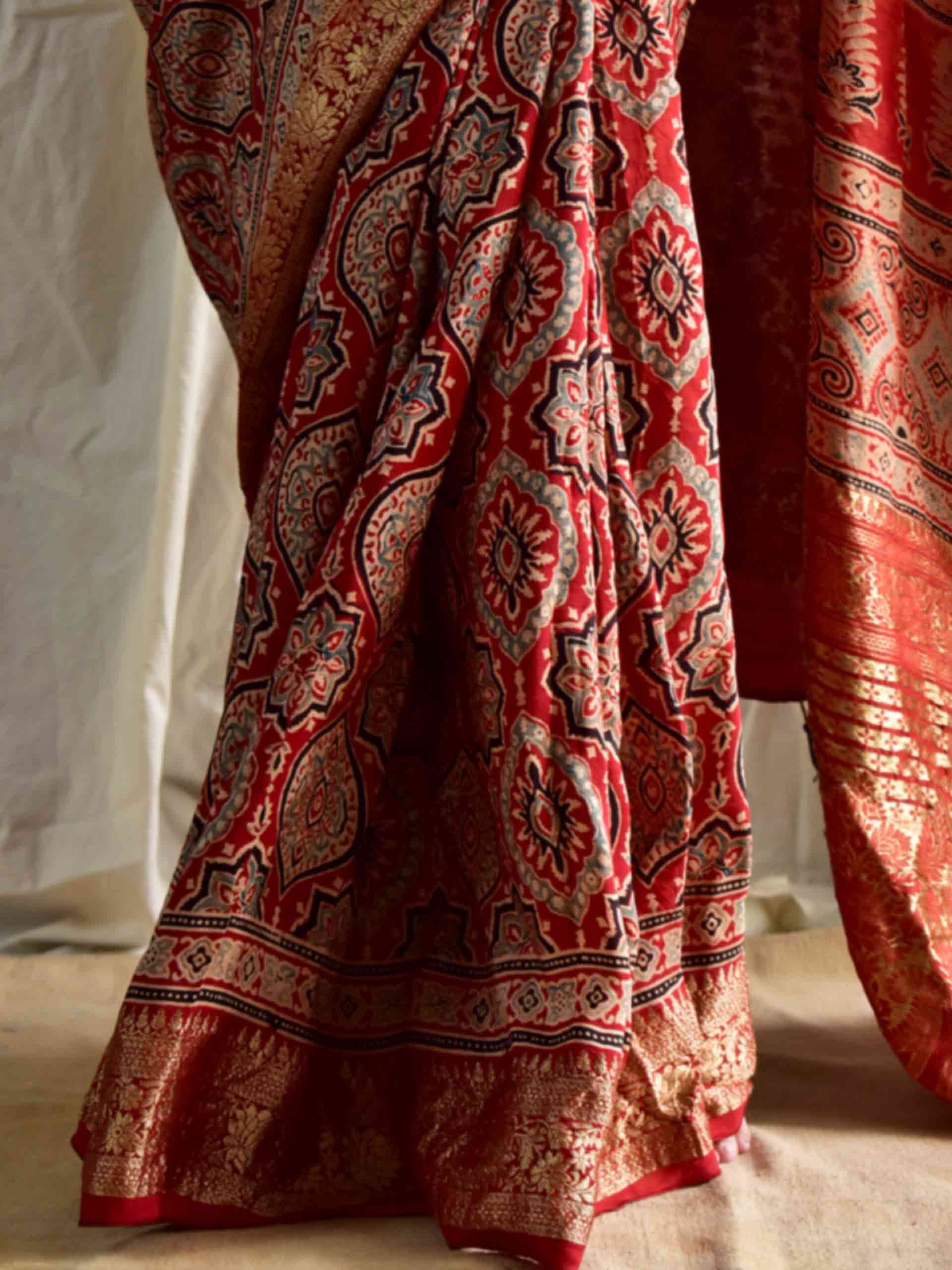 Sur - Ajrakh hand block printed Dola Silk zari border Saree