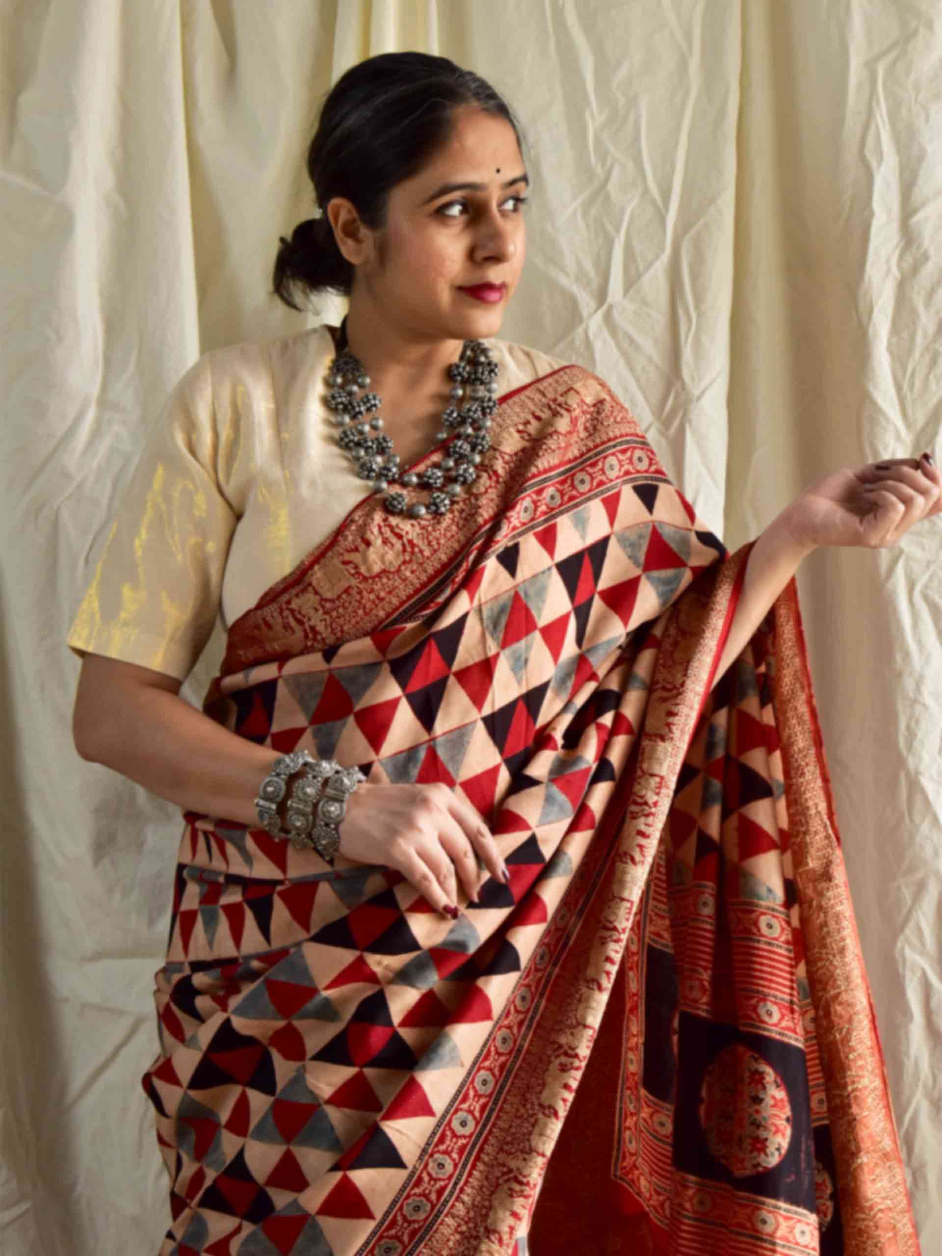 Khwahish - Ajrakh hand block printed Dola Silk zari border Saree